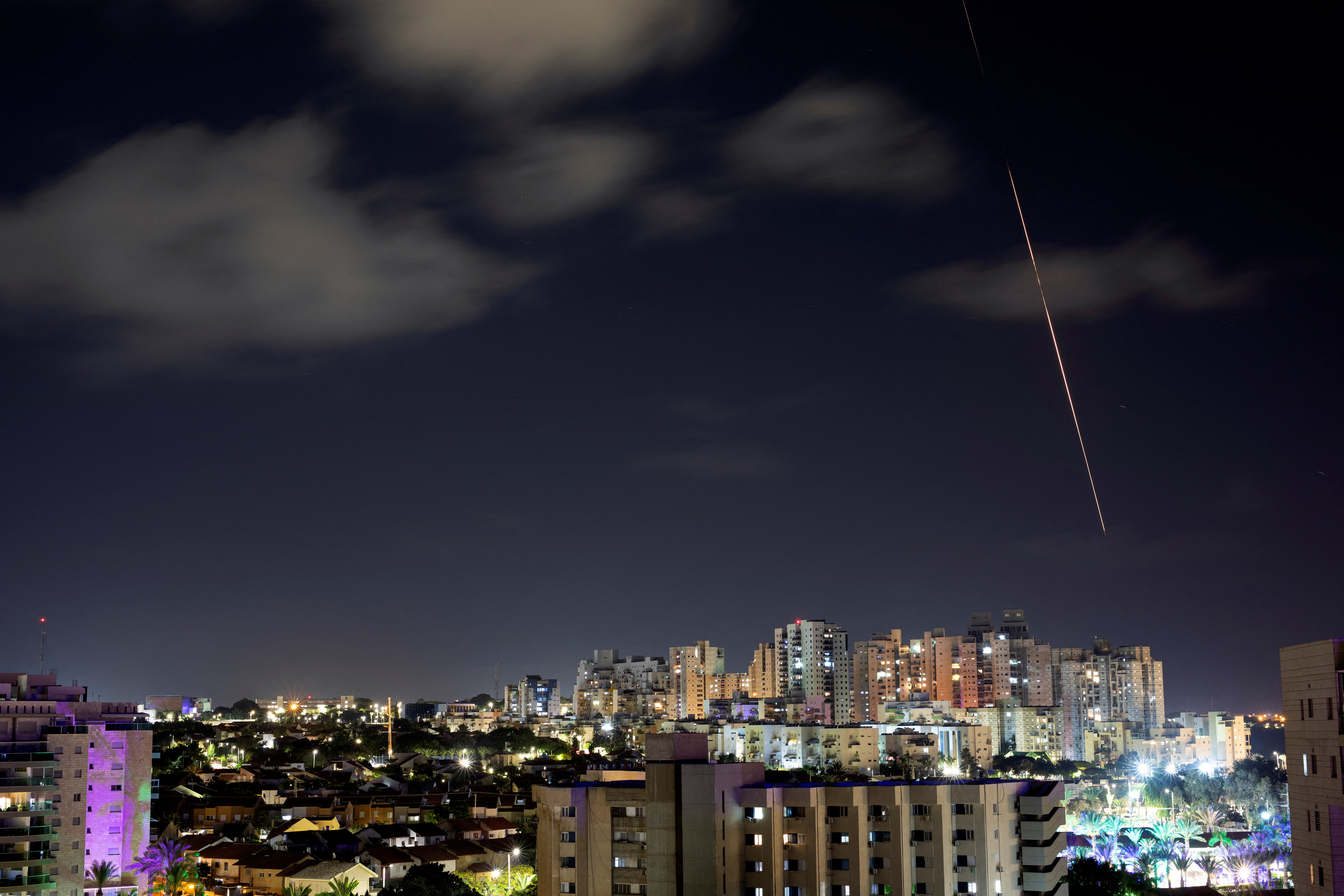 A view shows a rocket being launched from the Gaza Strip towards central Israel, as seen from Ashkelon in southern Israel