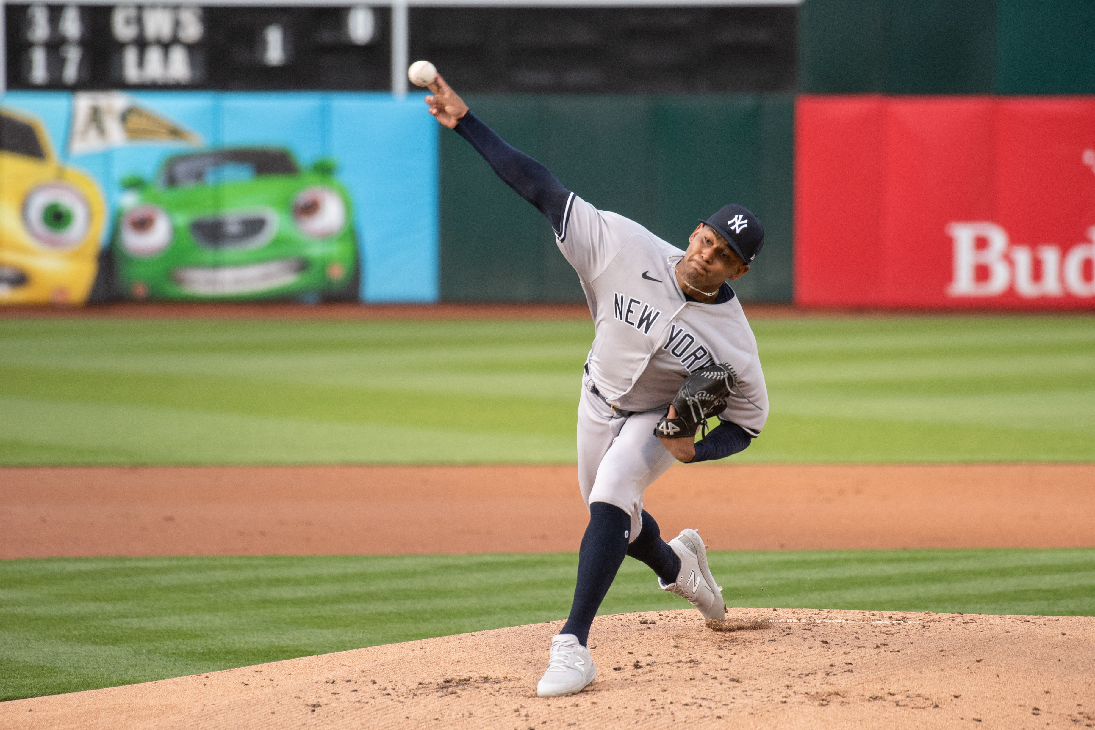 A's hold on to beat Yankees for first time this year