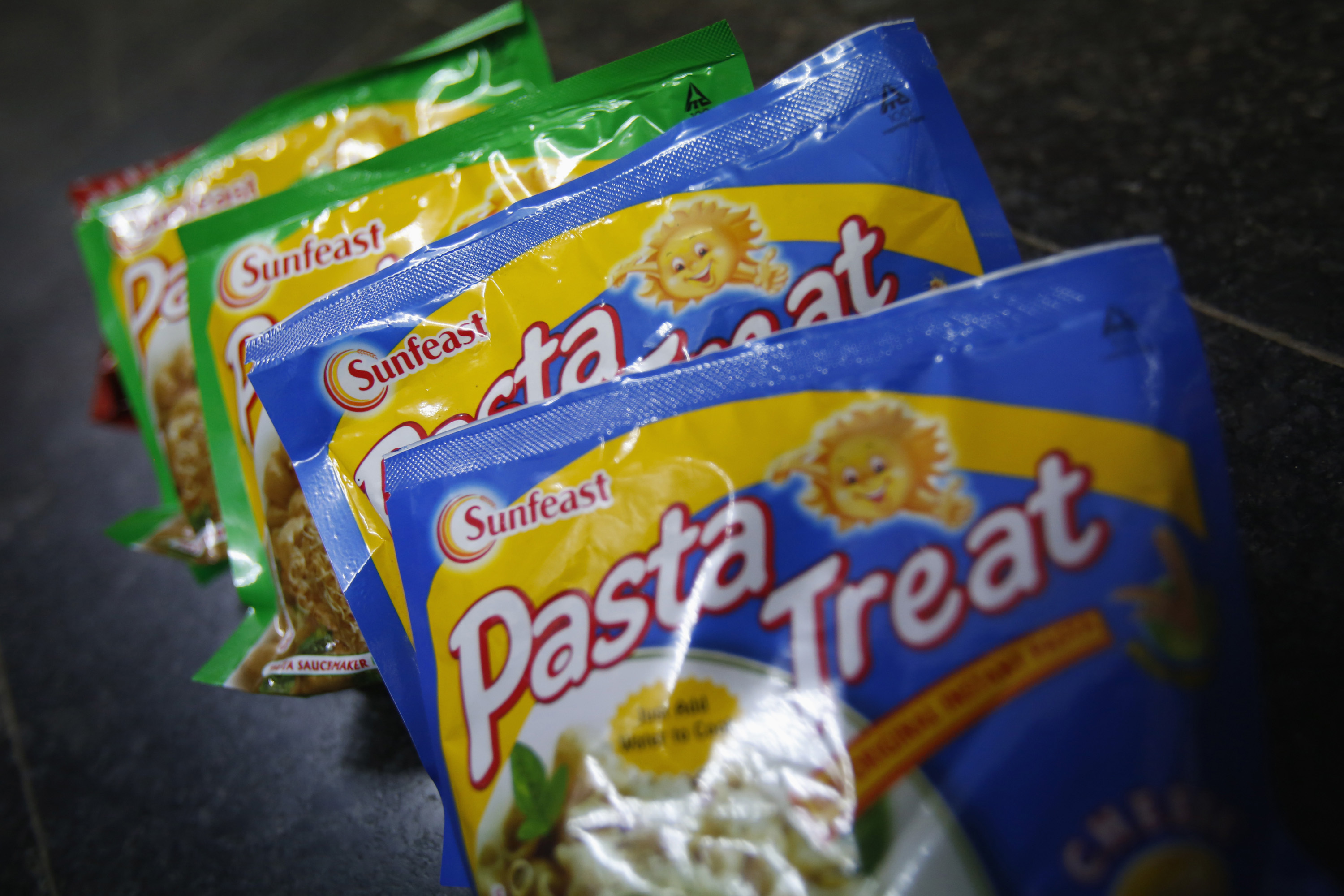 Sunfeast-branded instant past meals, which are part of a line of fast-moving consumer goods owned by Indian cigarette maker ITC, are displayed for sale at a grocery store in Mumbai