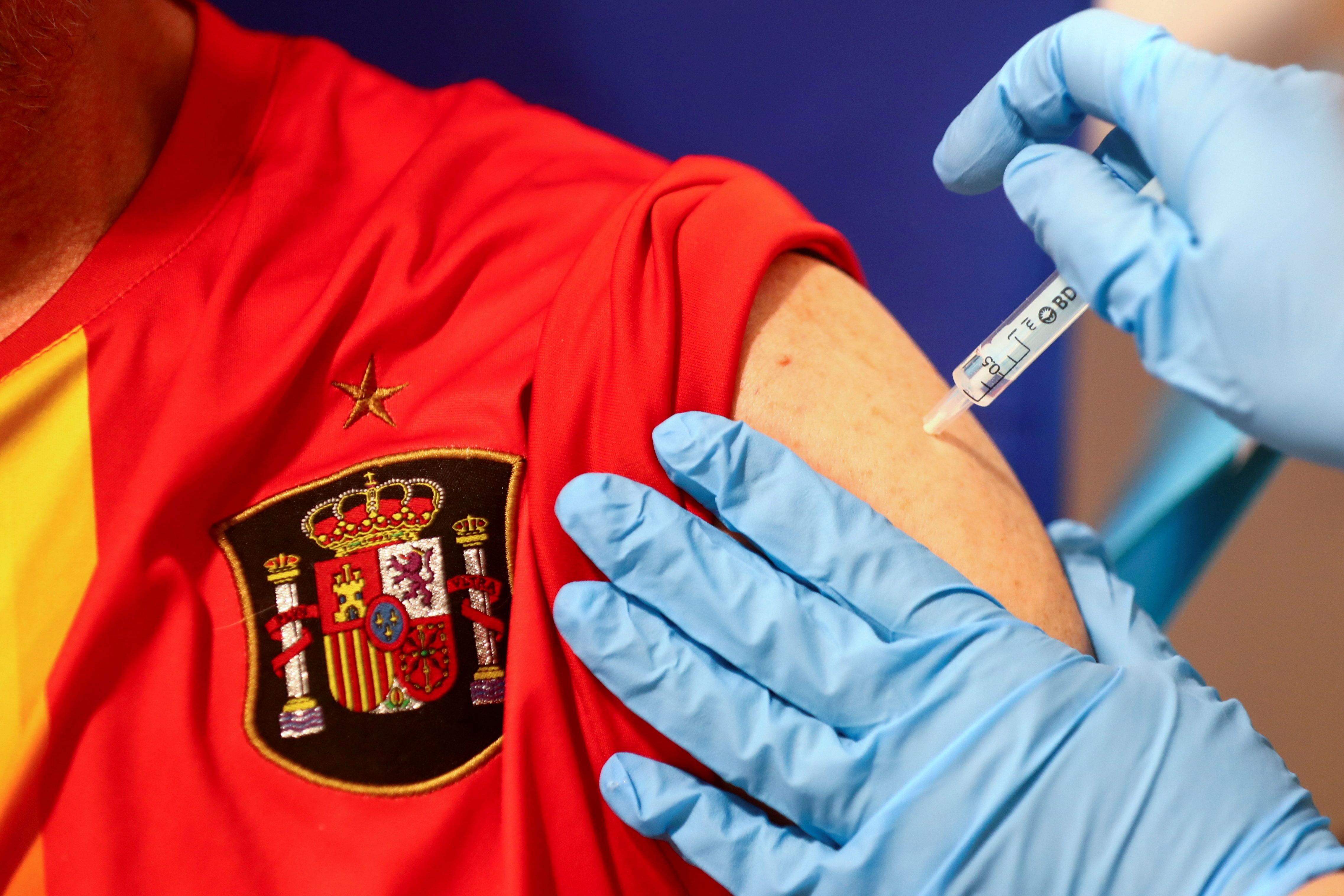 Man receives his first dose of the AstraZeneca COVID-19 vaccine in Madrid