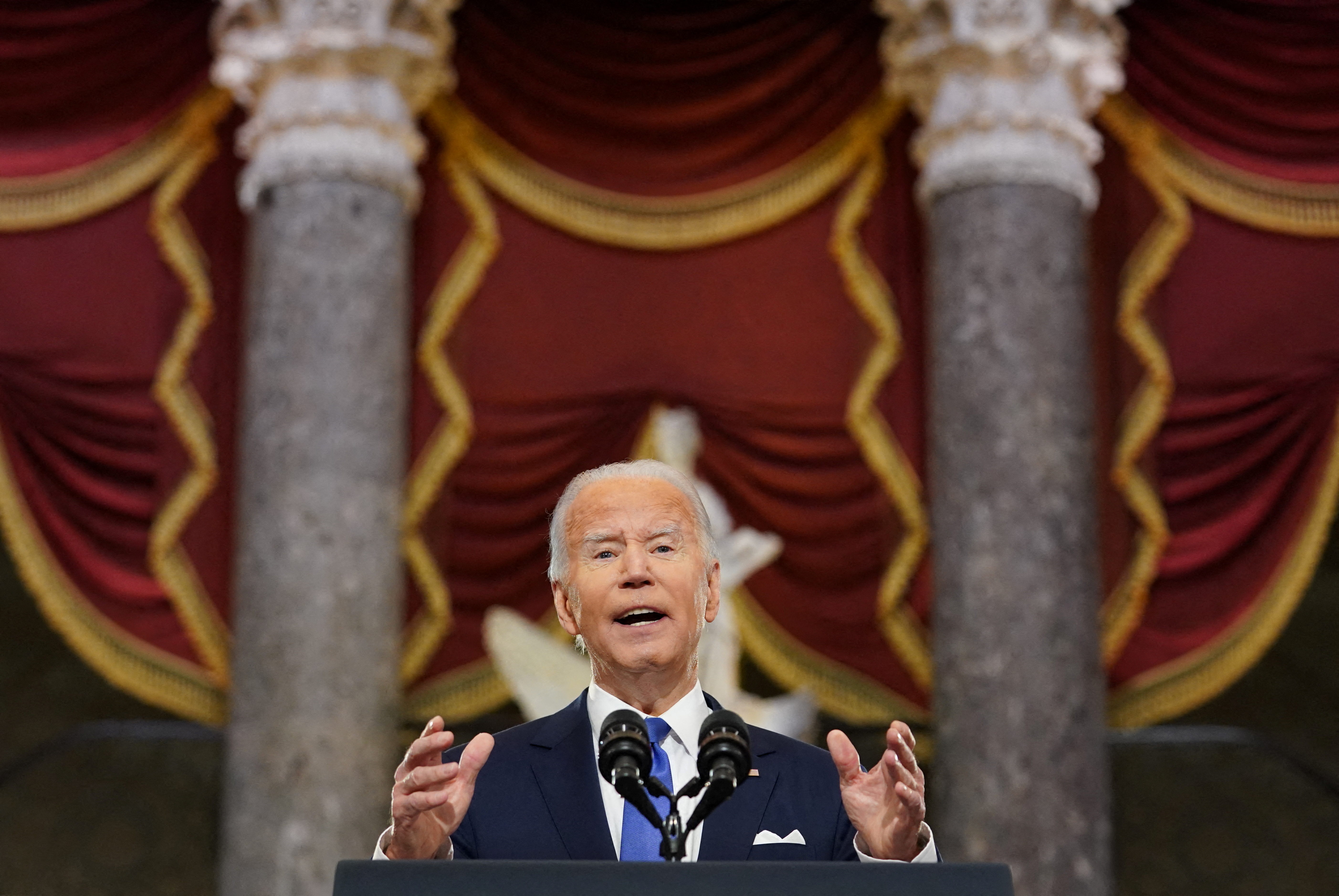 U.S. President Joe Biden speaks in Statuary Hall on the first anniversary of the January 6, 2021 attack on the U.S. Capitol by supporters of former President Donald Trump, on Capitol Hill in Washington, U.S., January 6, 2022. REUTERS/Kevin Lamarque