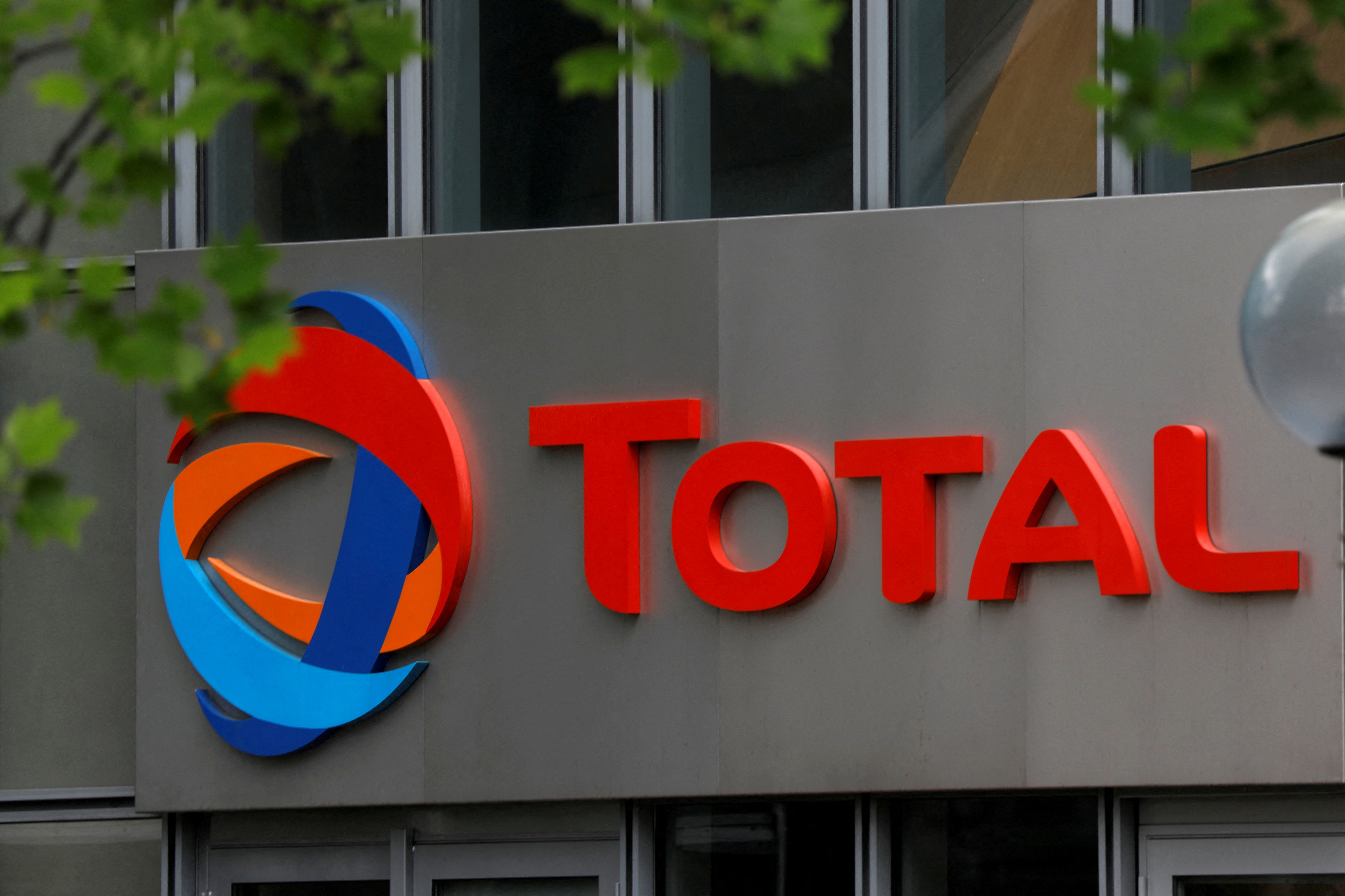 The logo of French oil giant Total is seen at La Defense business and financial district in Courbevoie