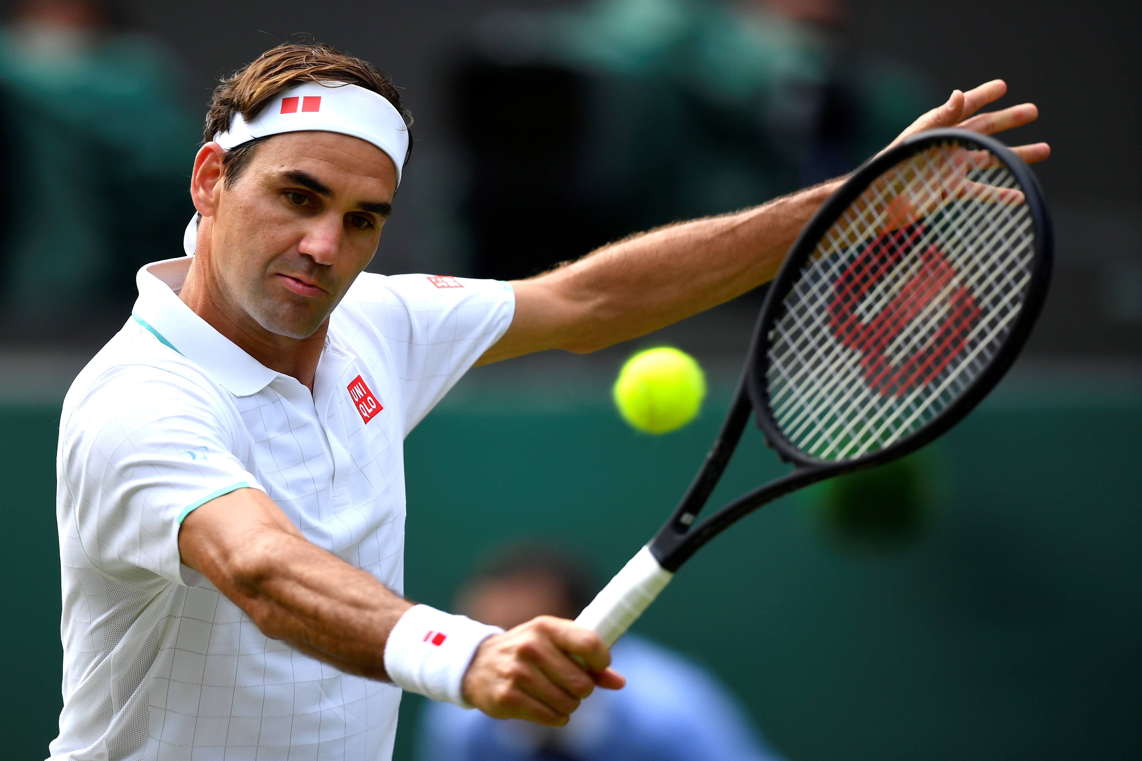 Switzerland's Roger Federer in action during his third round match at Wimbledon