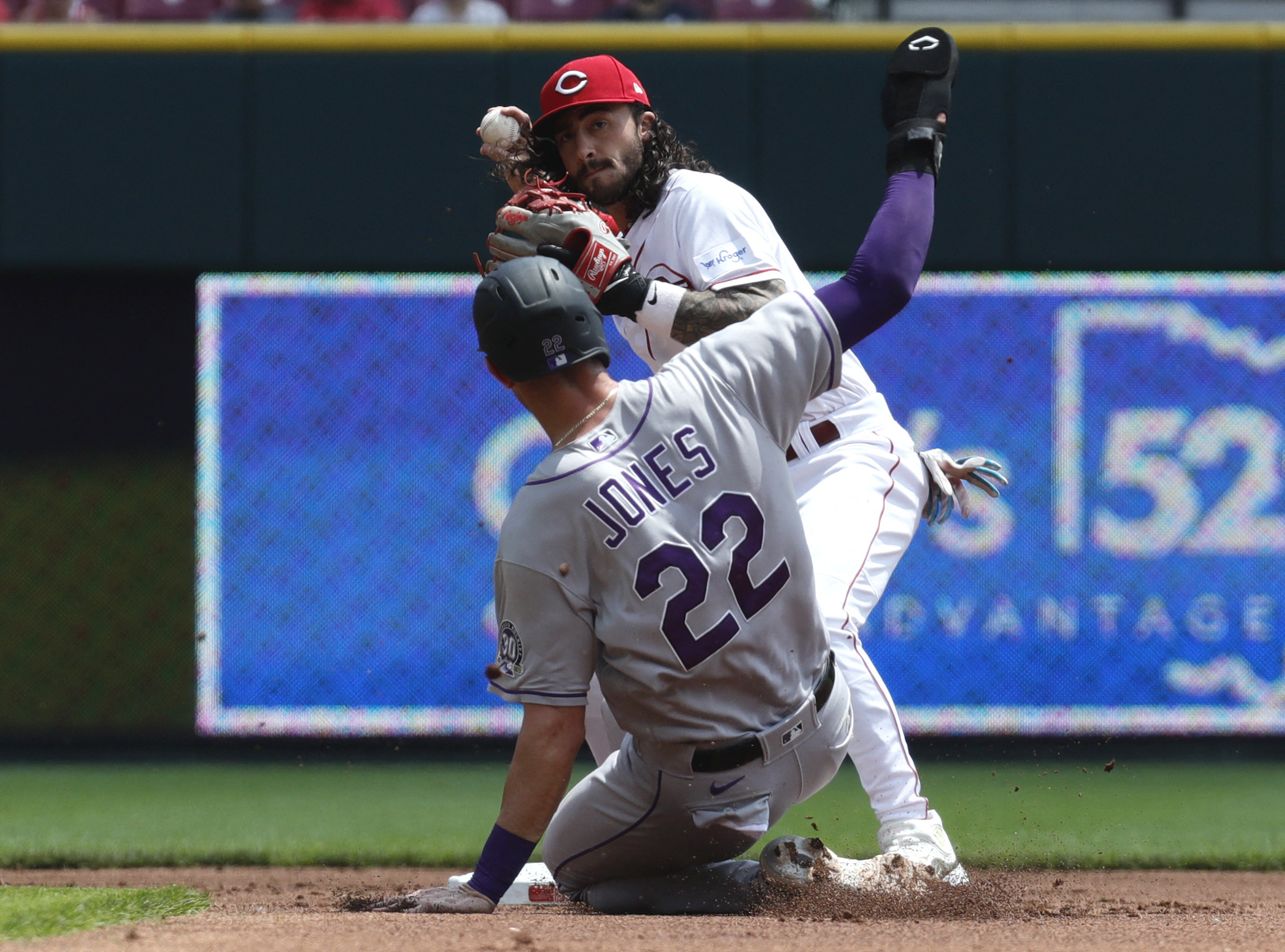 Reds beat Rockies, stretch winning streak to 11