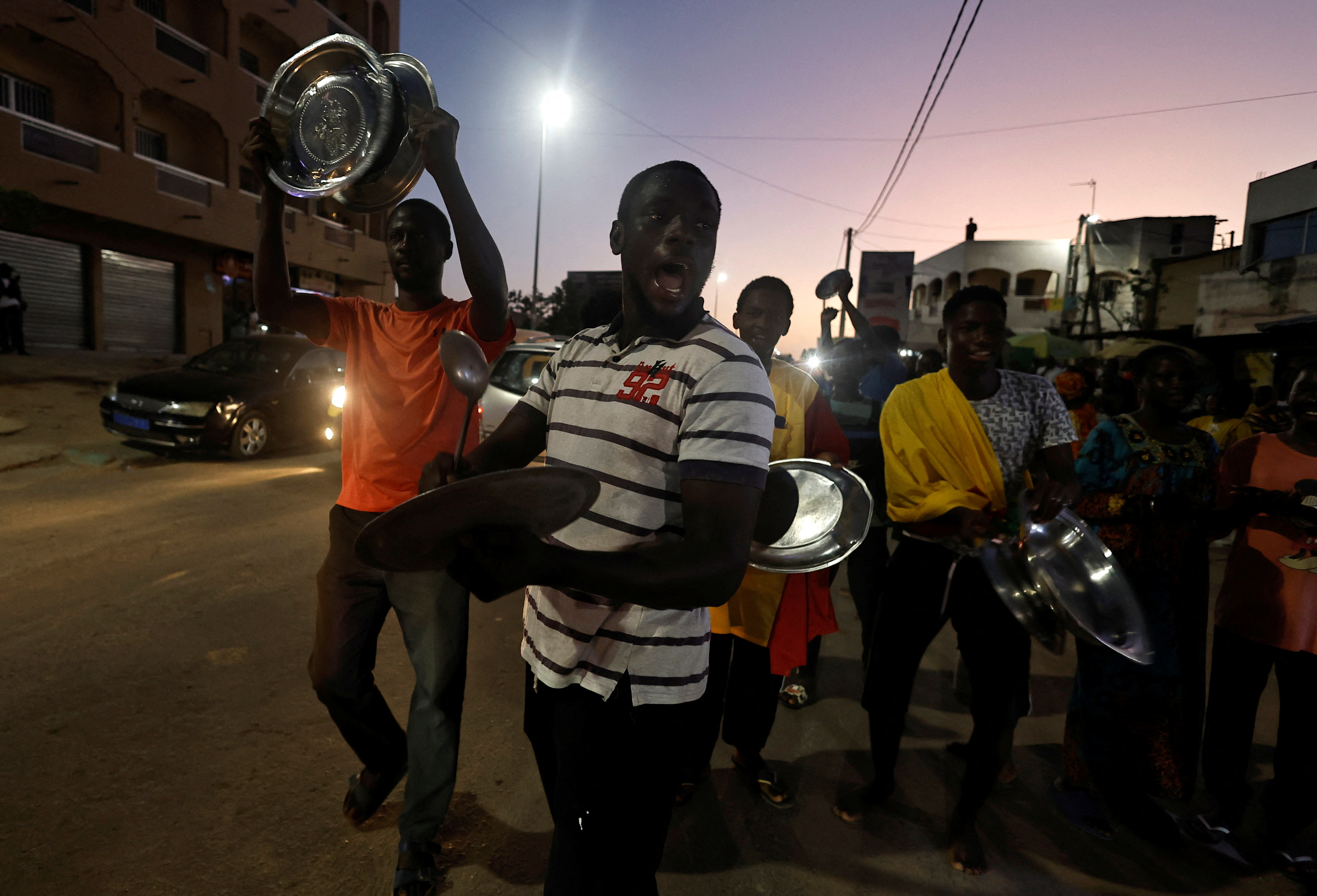 Senegal’s opposition  supporters bang pots and pans in noisy protest