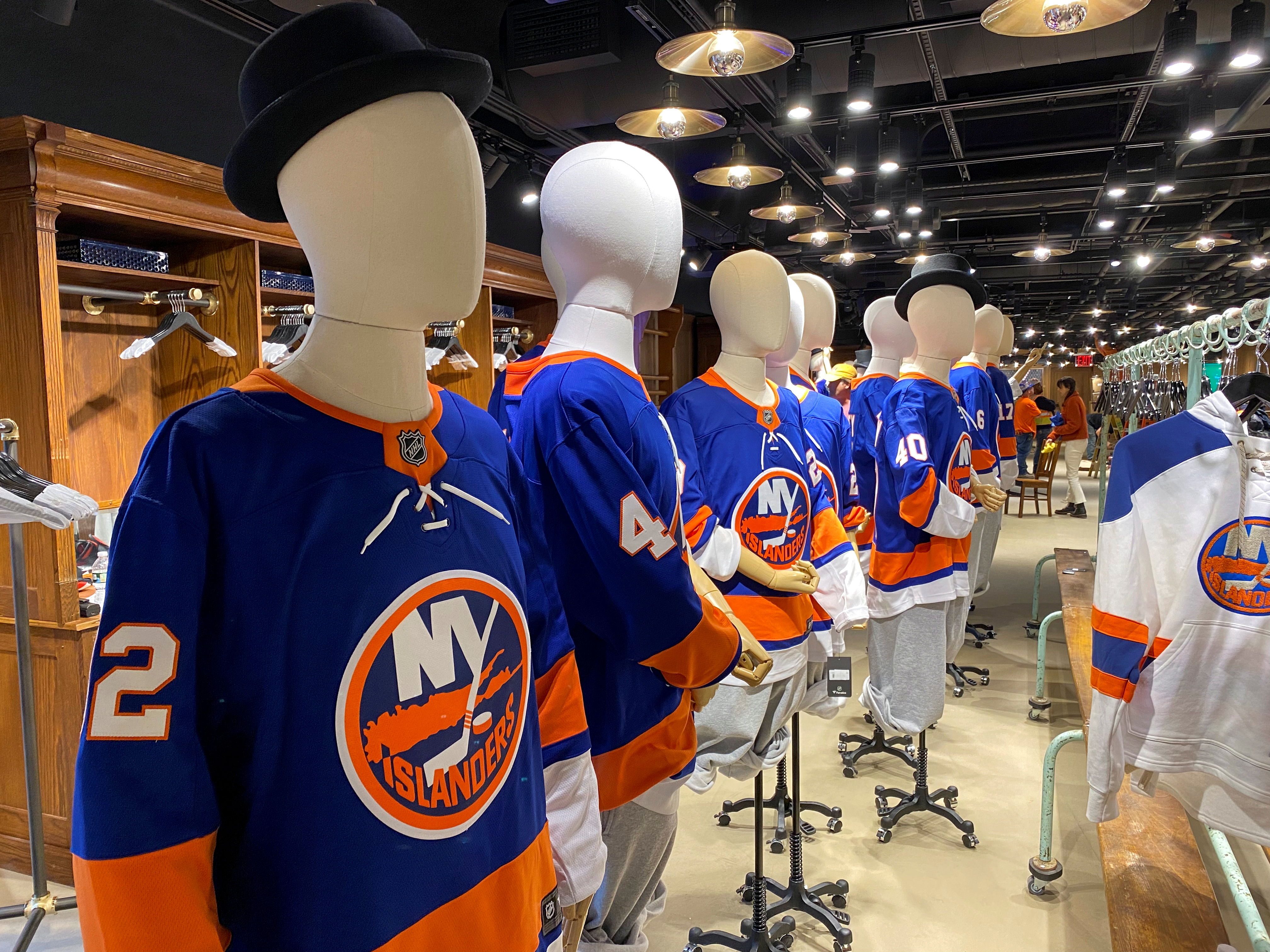 Islanders' jerseys are displayed inside a team store at UBS Arena in Elmont, New York
