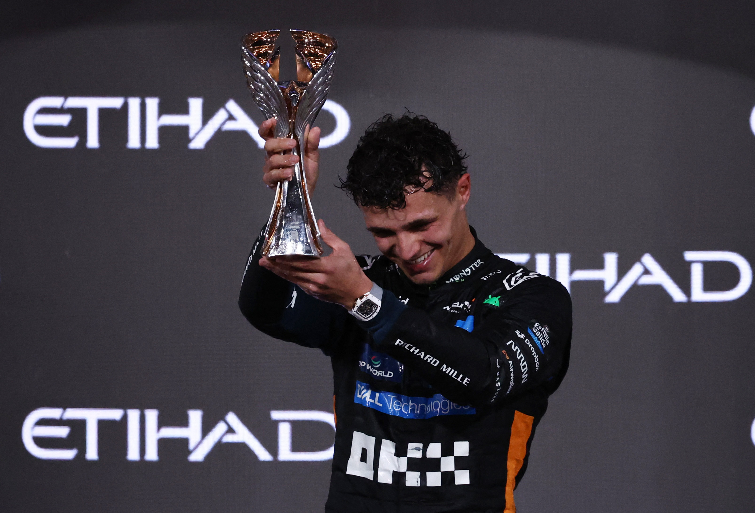 Tearful Norris takes F1 title as Verstappen wins Abu Dhabi race