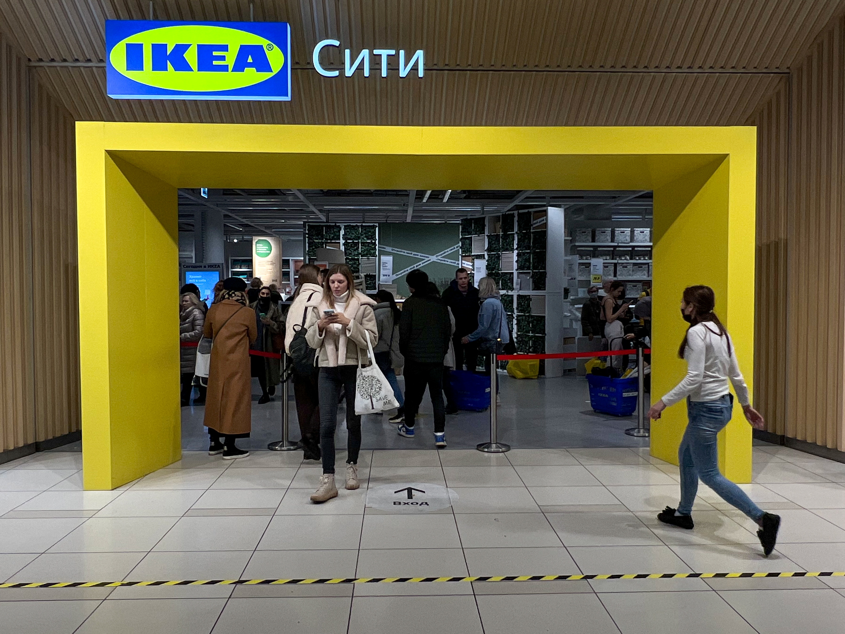 Customers shop in IKEA store in Moscow