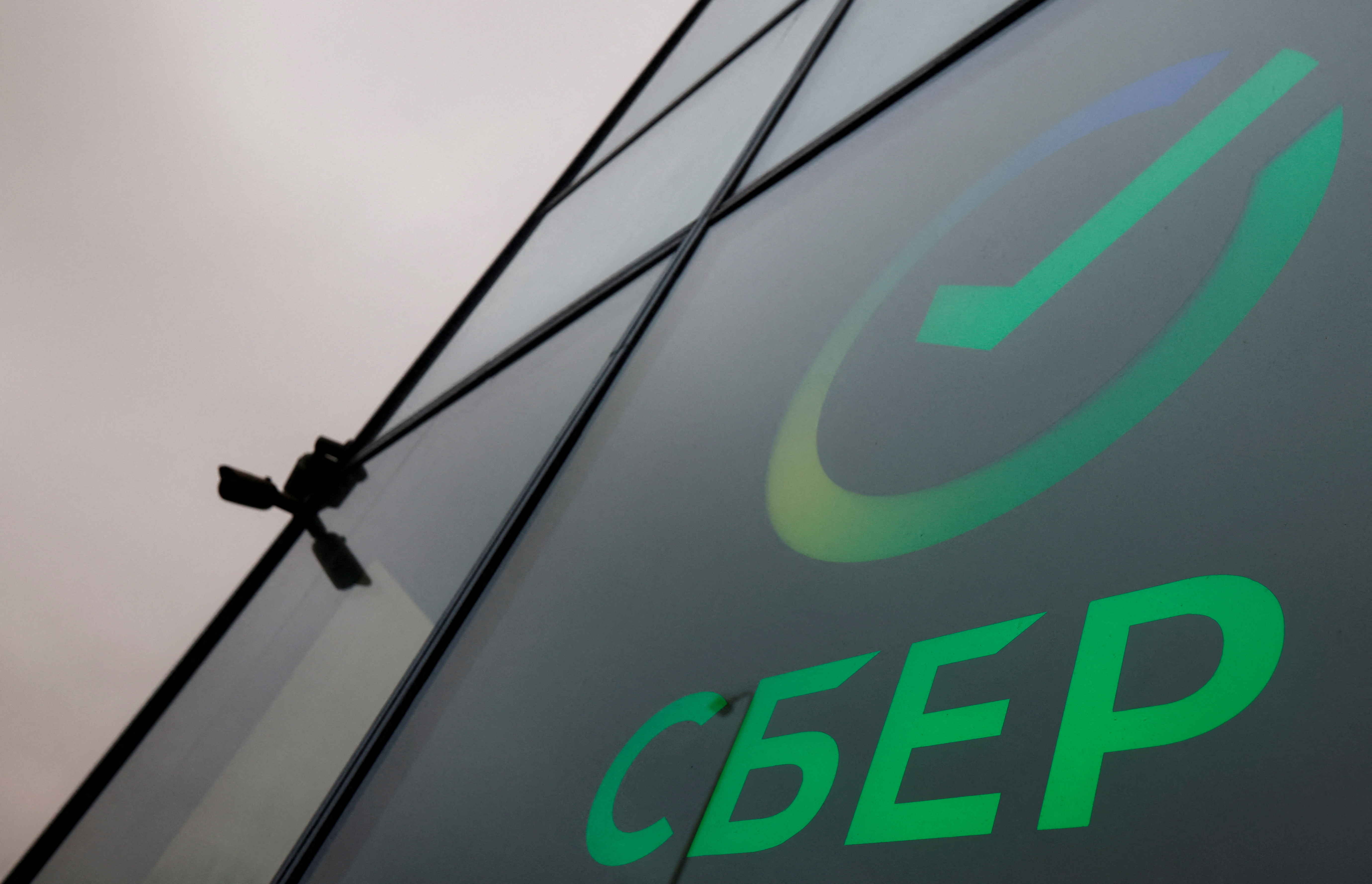 The logo is on display in an office of the Russian largest lender Sberbank in Moscow
