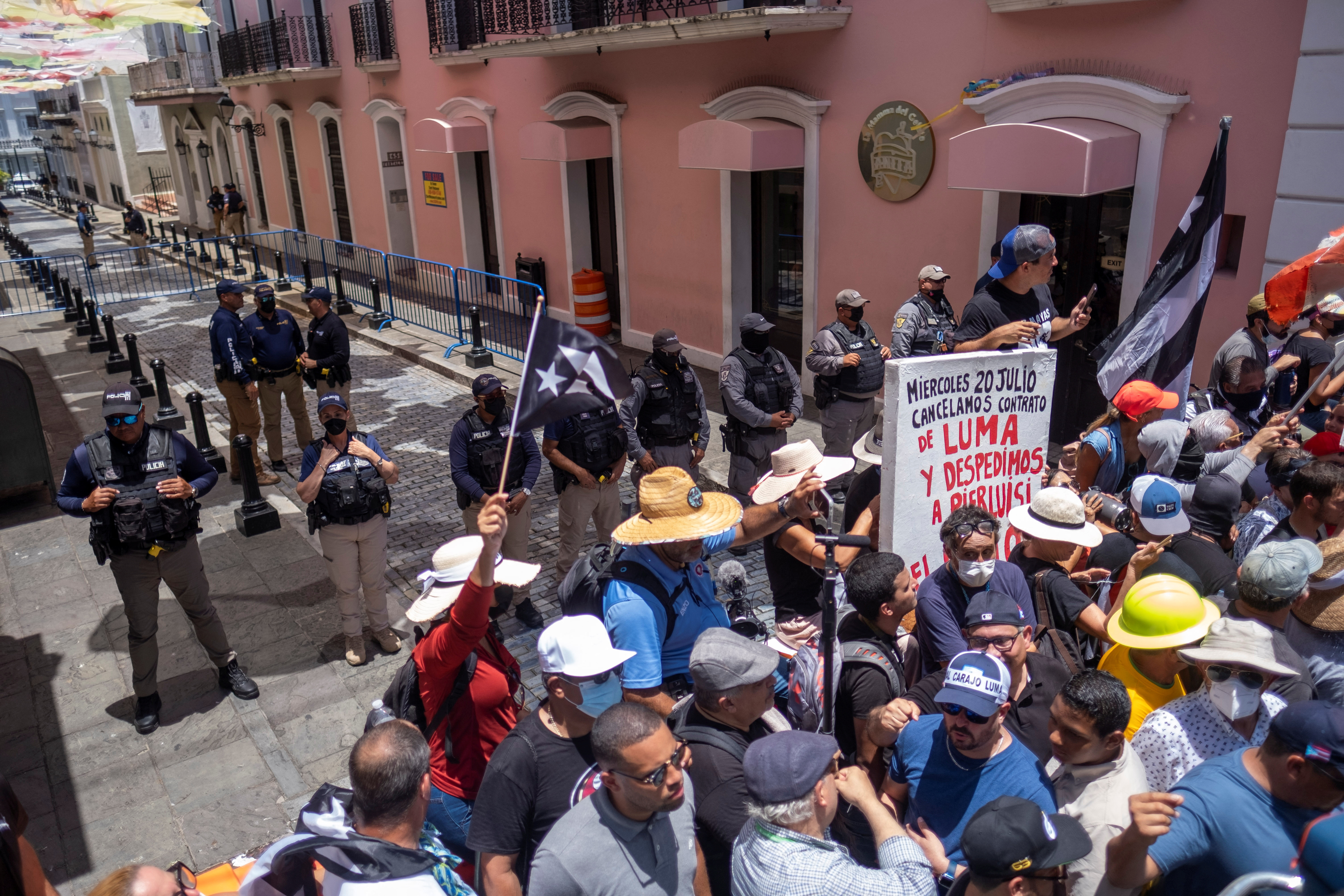 Puerto Ricans protest over unused emergency aid, demand