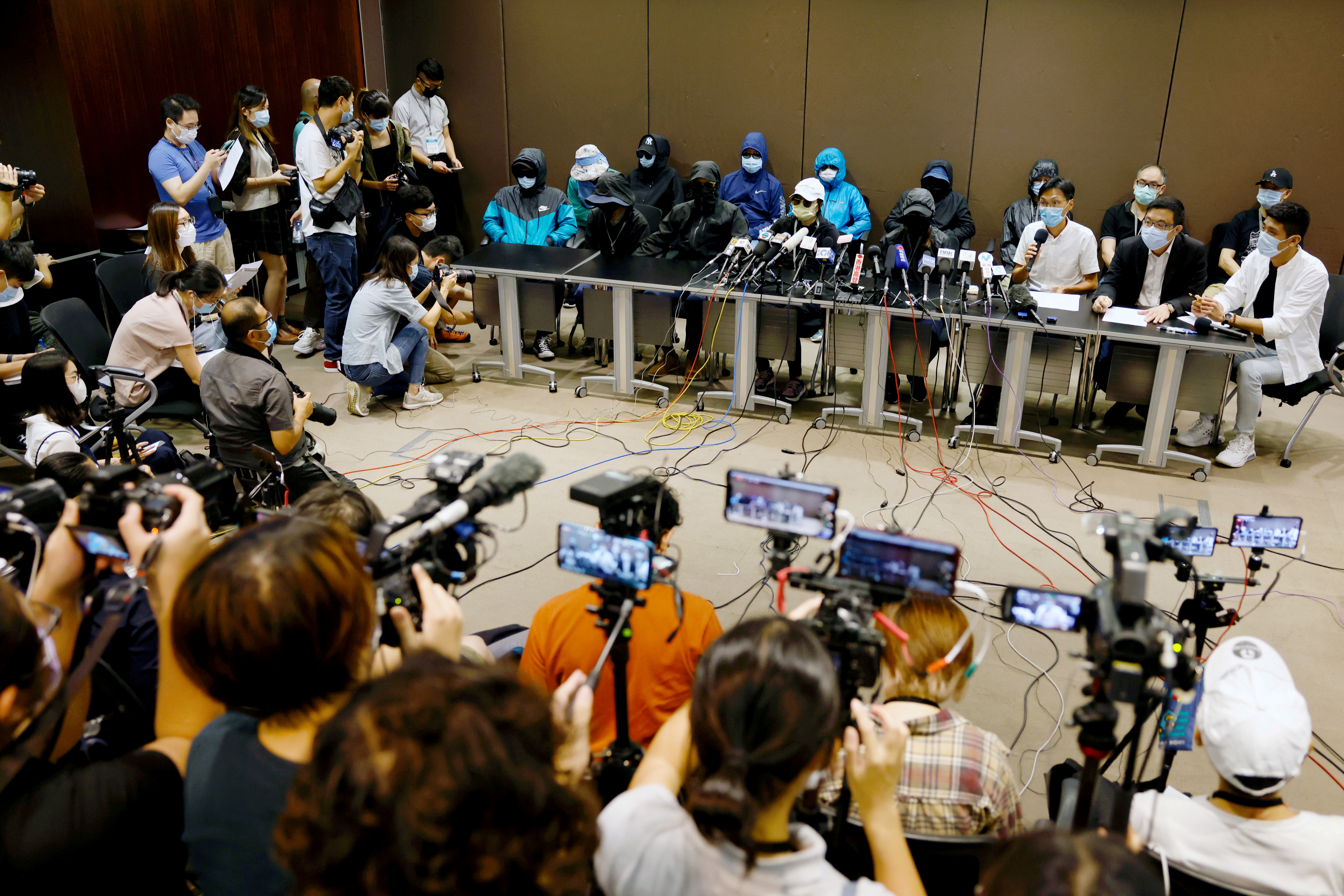 Family members of twelve Hong Kong activists hold a news conference to seek help in Hong Kong