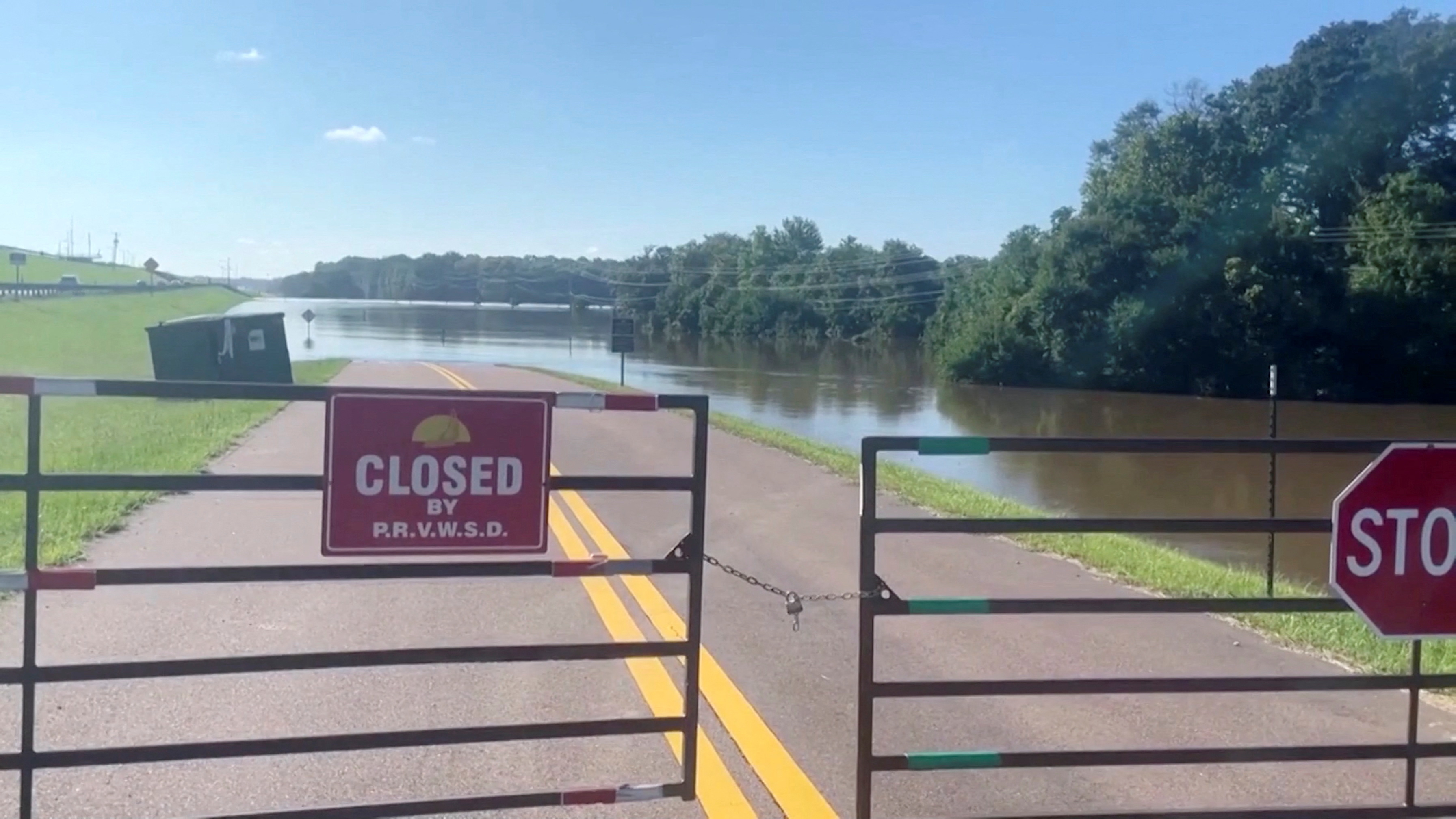 Flood waters in Mississippi cover roads and fields