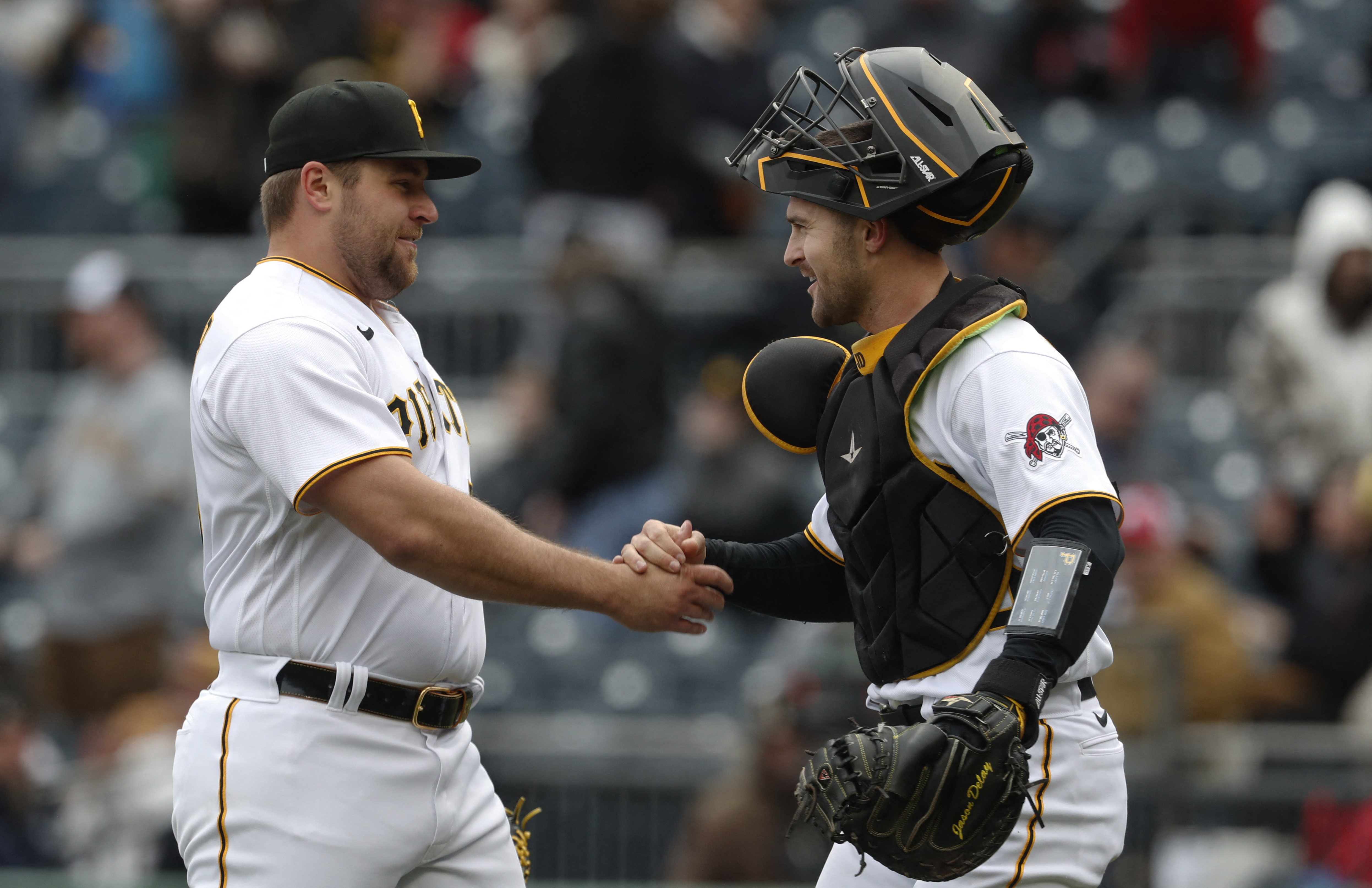 Vince Velasquez strikes out 10 as Pirates sweep Reds for 7th straight win,  move into 1st place