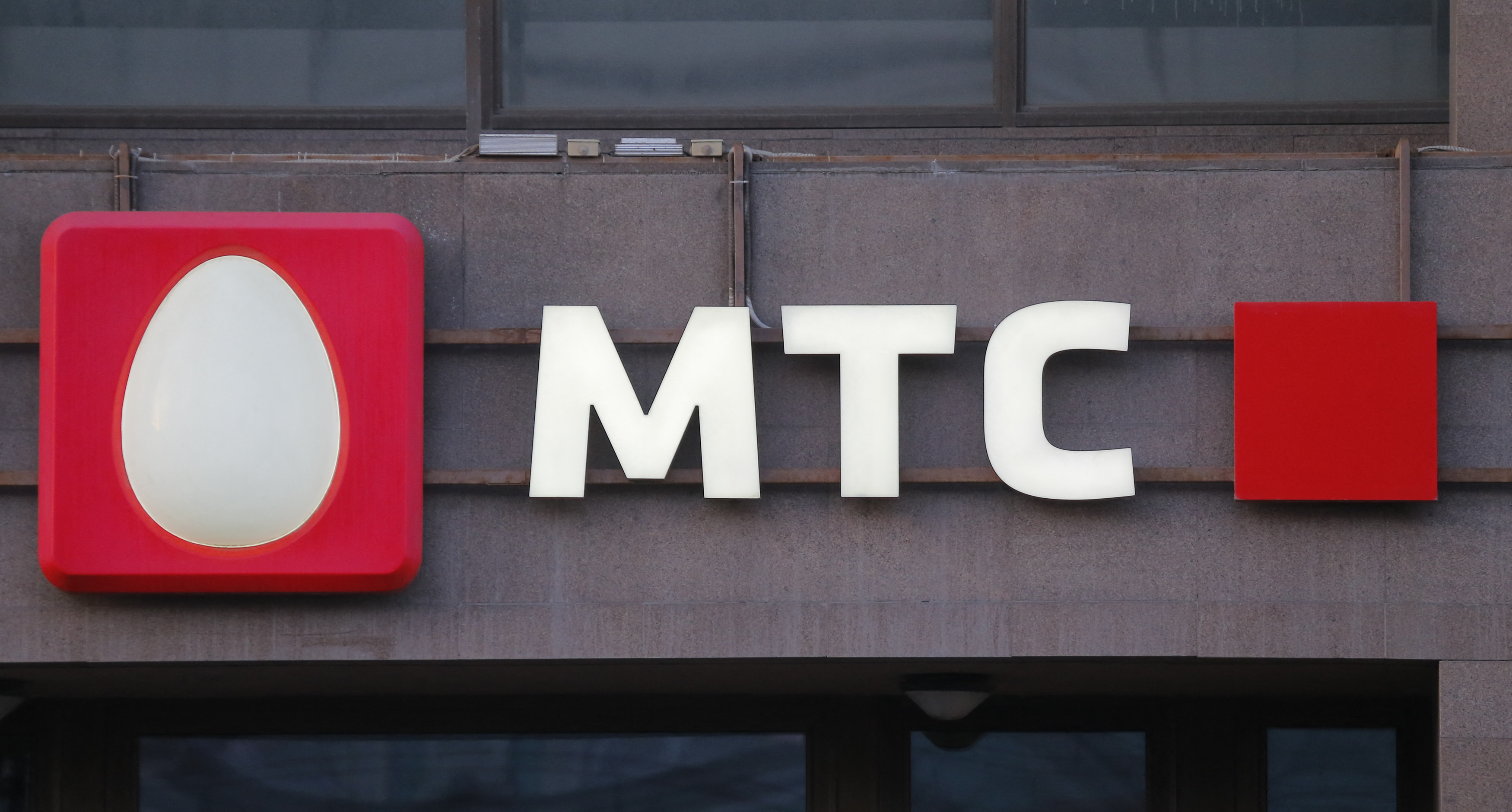 Logo of MTS mobile phone operator is seen on building in central Moscow