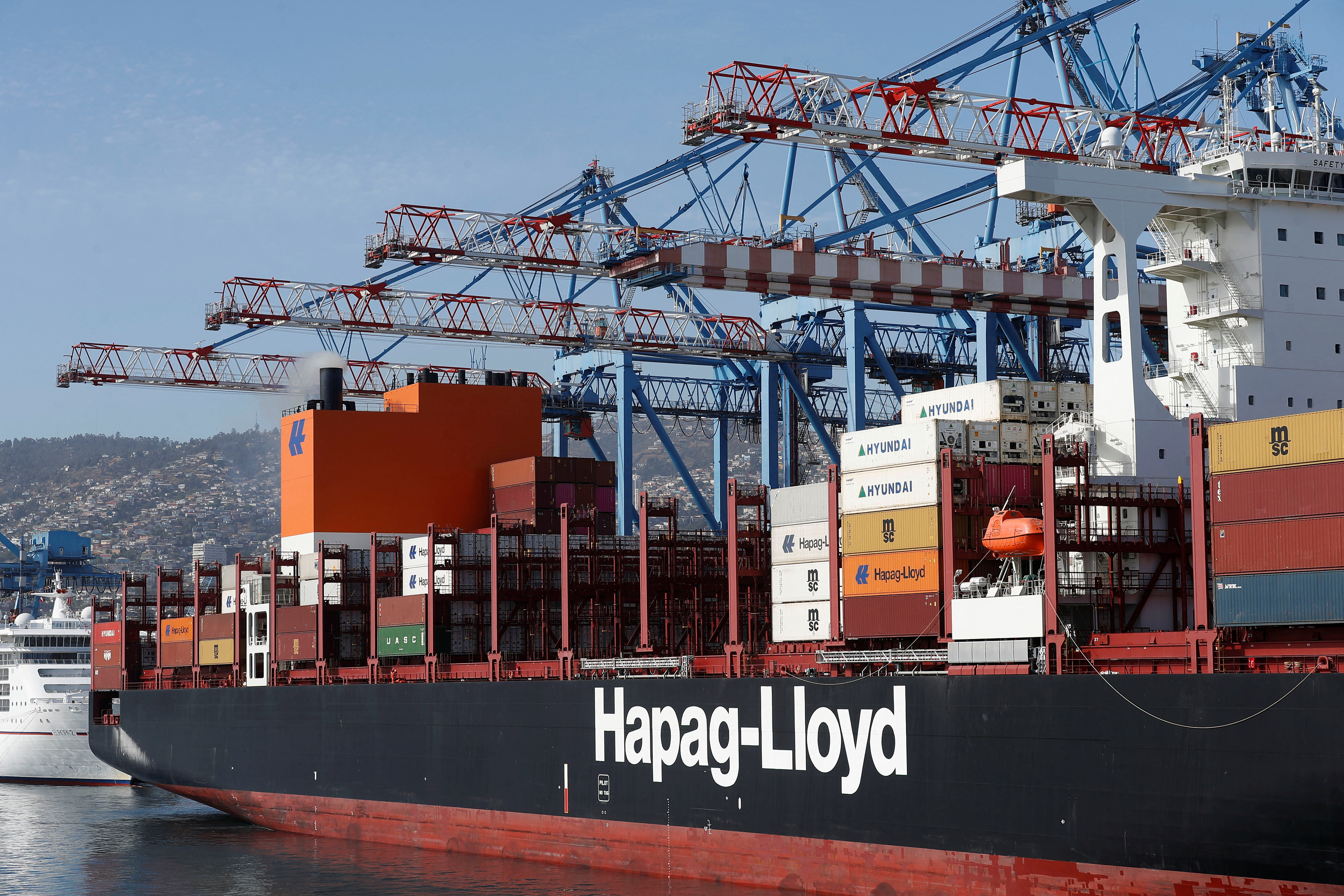 Hapag-Lloyd sign on a container ship is pictured at the Valparaiso port