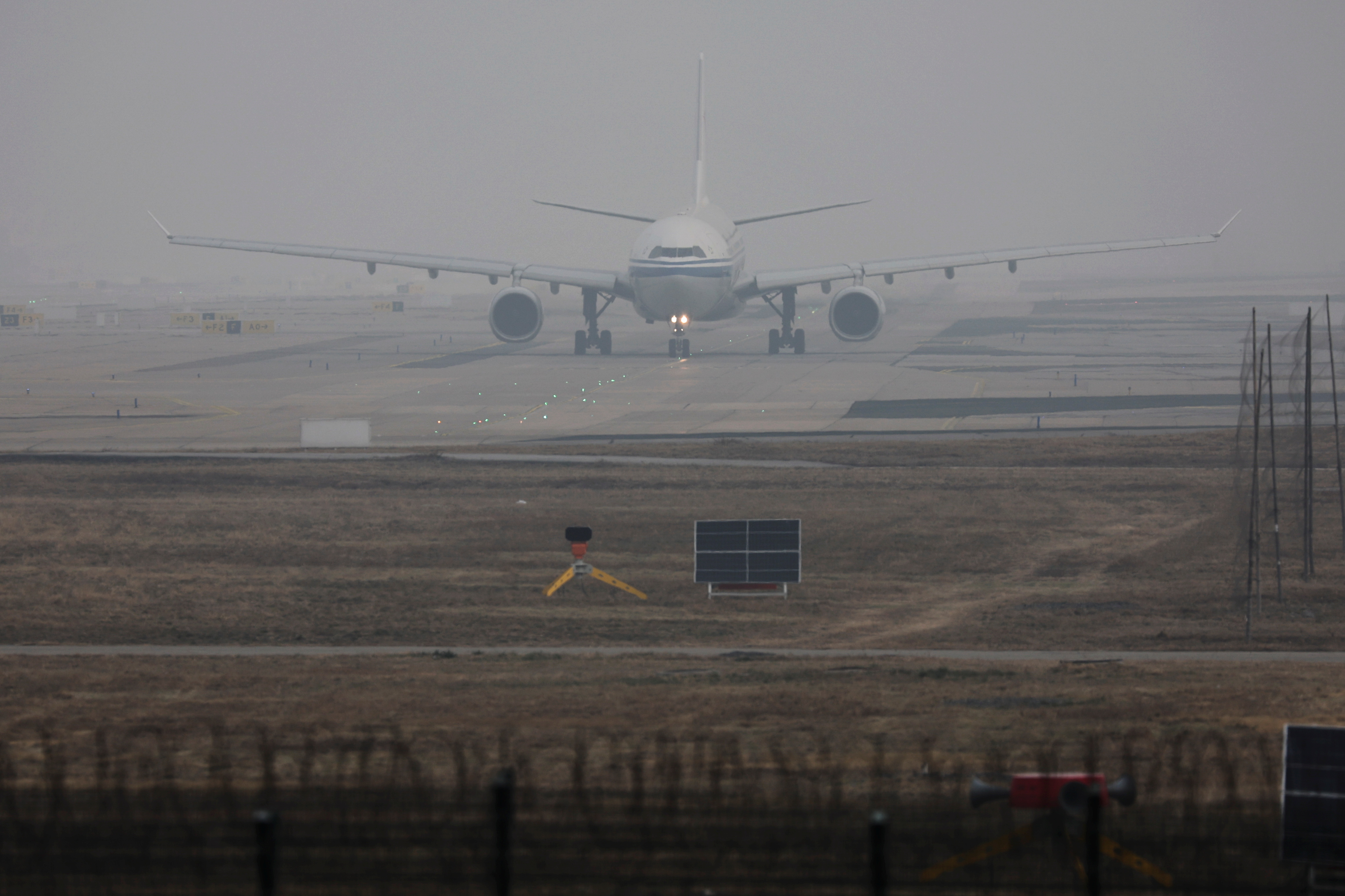 Airplane takes off at the Beijing Capital International Airport in Beijing, China