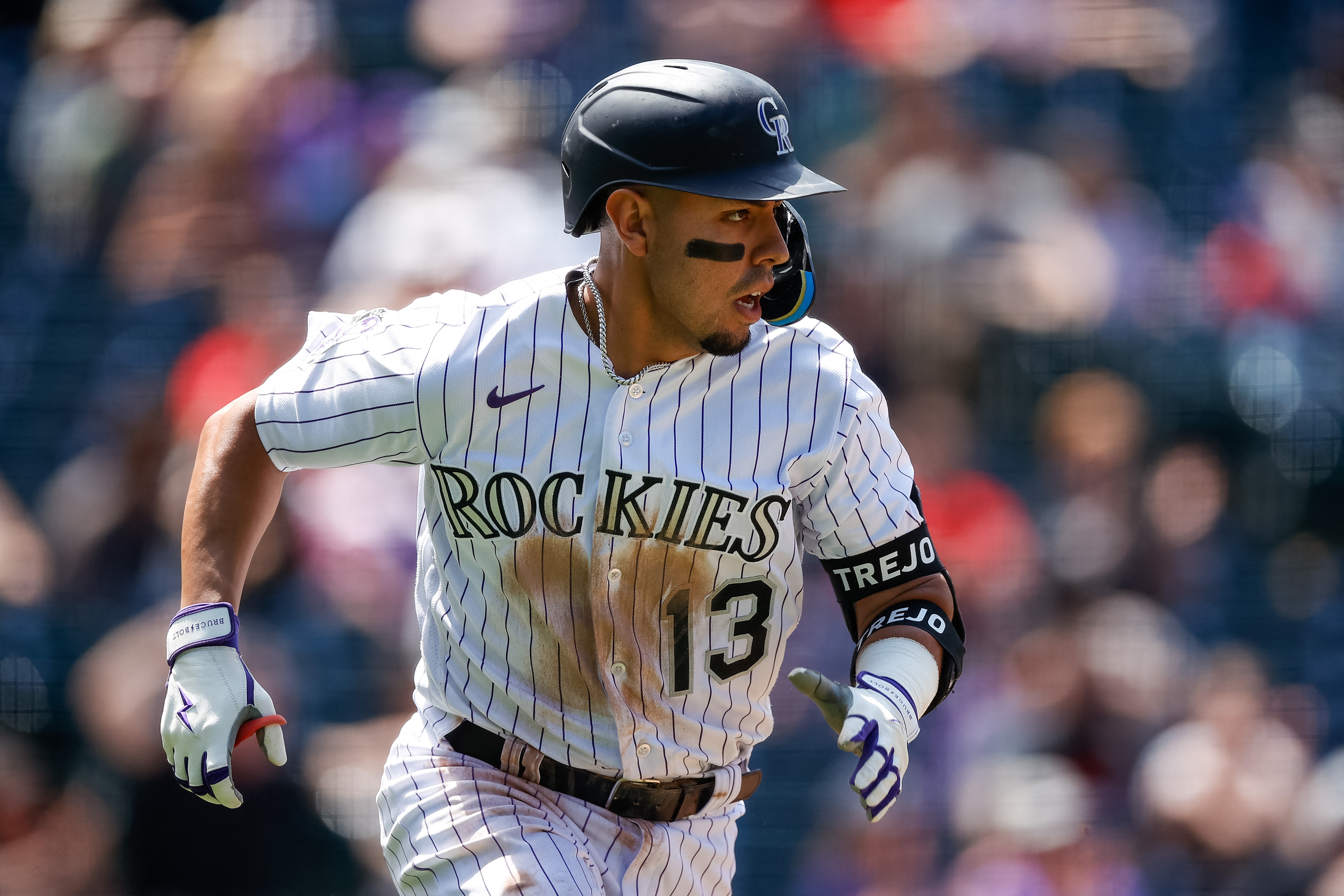 Rockies blow ninth-inning lead, but beat Marlins 7-6 on Ezequiel