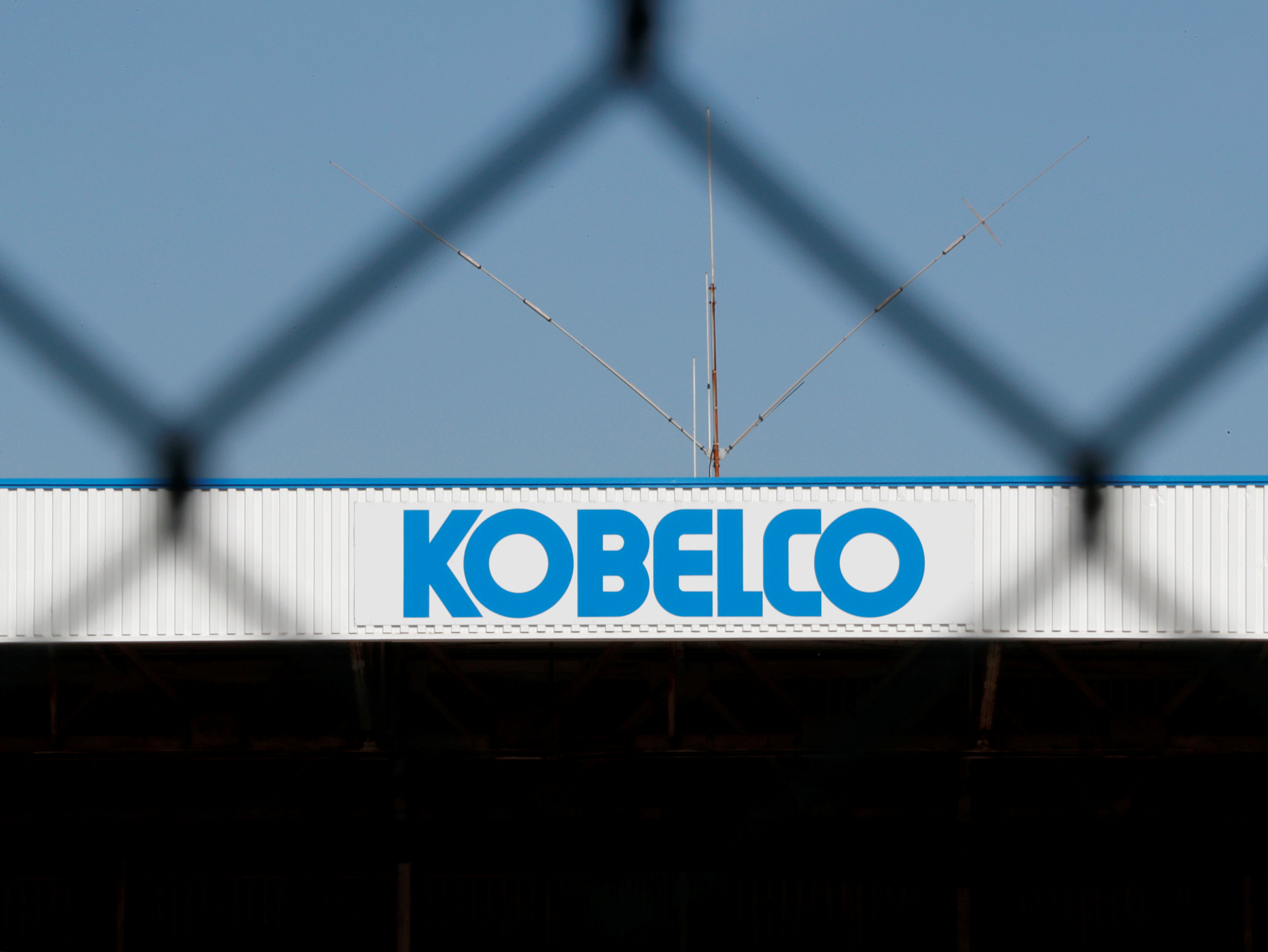 Kobe Steel's logo is seen through a fence at a facility of Kakogawa Works in Kakogawa