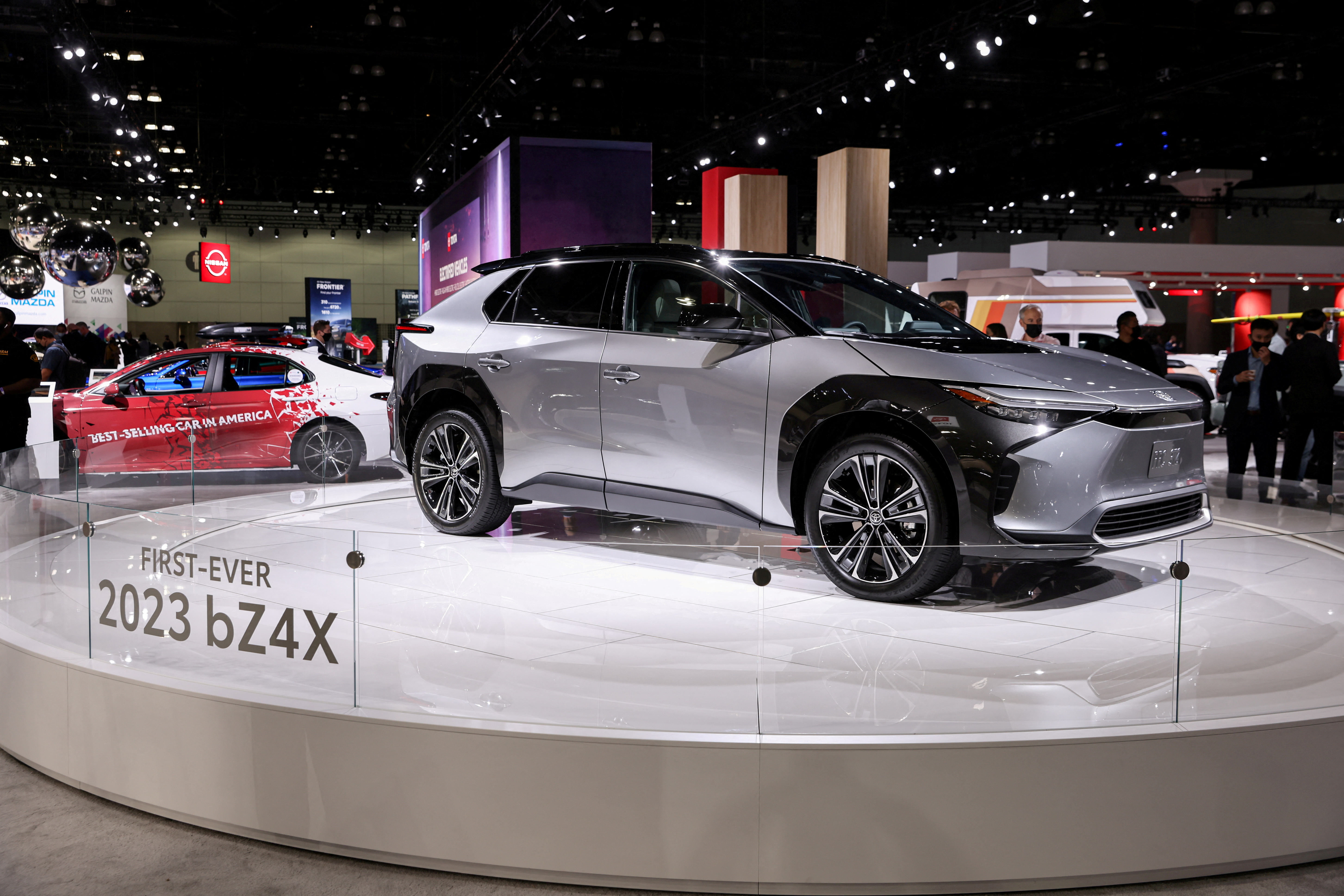 A 2023 Toyota bZ4X all-electric SUV is displayed during the 2021 LA Auto Show