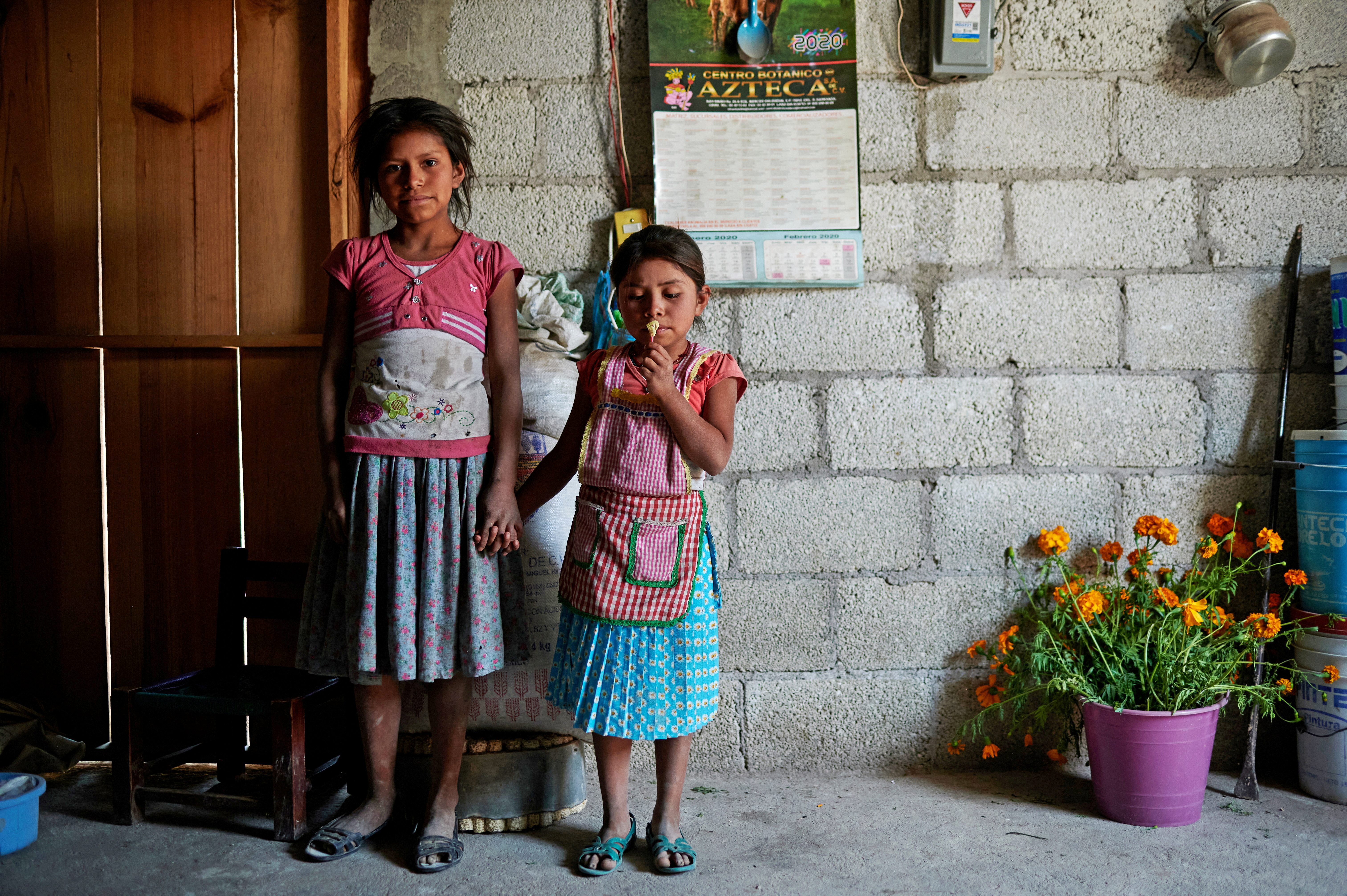 Children of the Nahua indigenous community of Alcozacan are seen in their house, before a demonstration by children carrying replicas of toy and wooden weapons, in the town of Alcozacan, Guerrero state , Mexico April 29, 2021. REUTERS /Mahe Elipe TPX IMAGES OF THE DAY