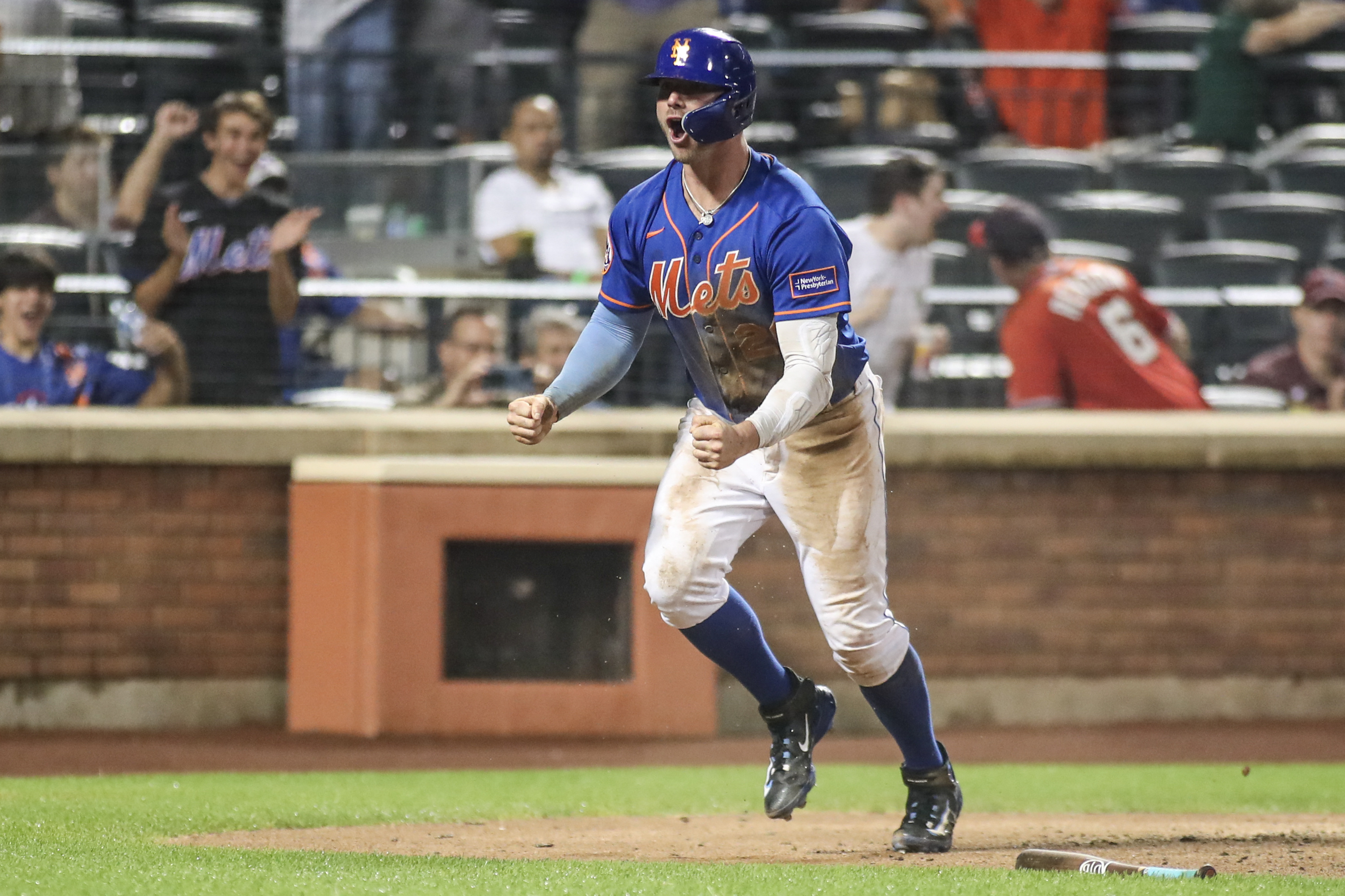 After rain delay, Mets eke out win over Nationals