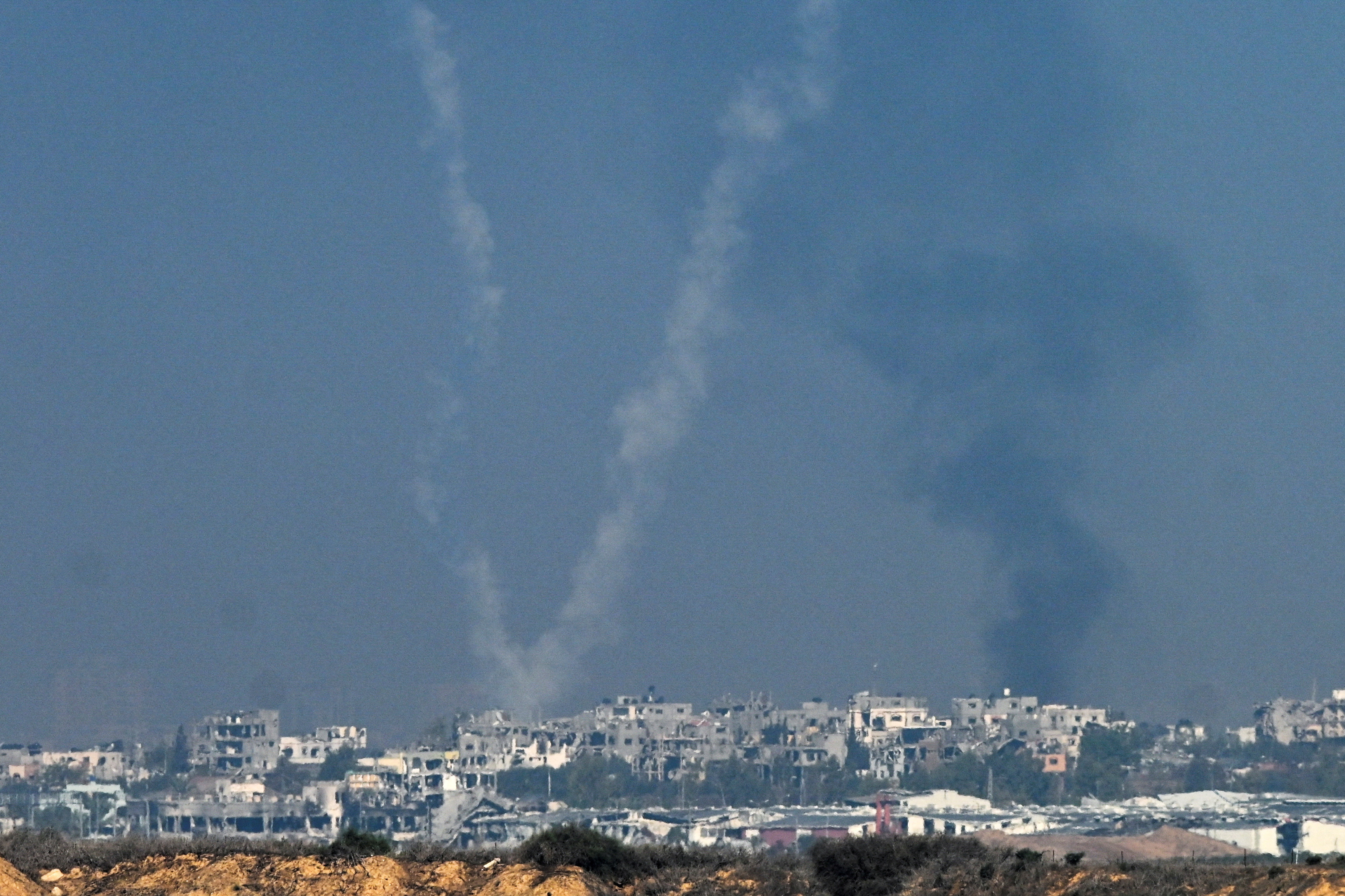 Rockets are launched from the Gaza Strip into Israel, after a temporary truce between Israel and the Palestinian Islamist group Hamas expired, as seen from Israel's border with Gaza in southern Israel