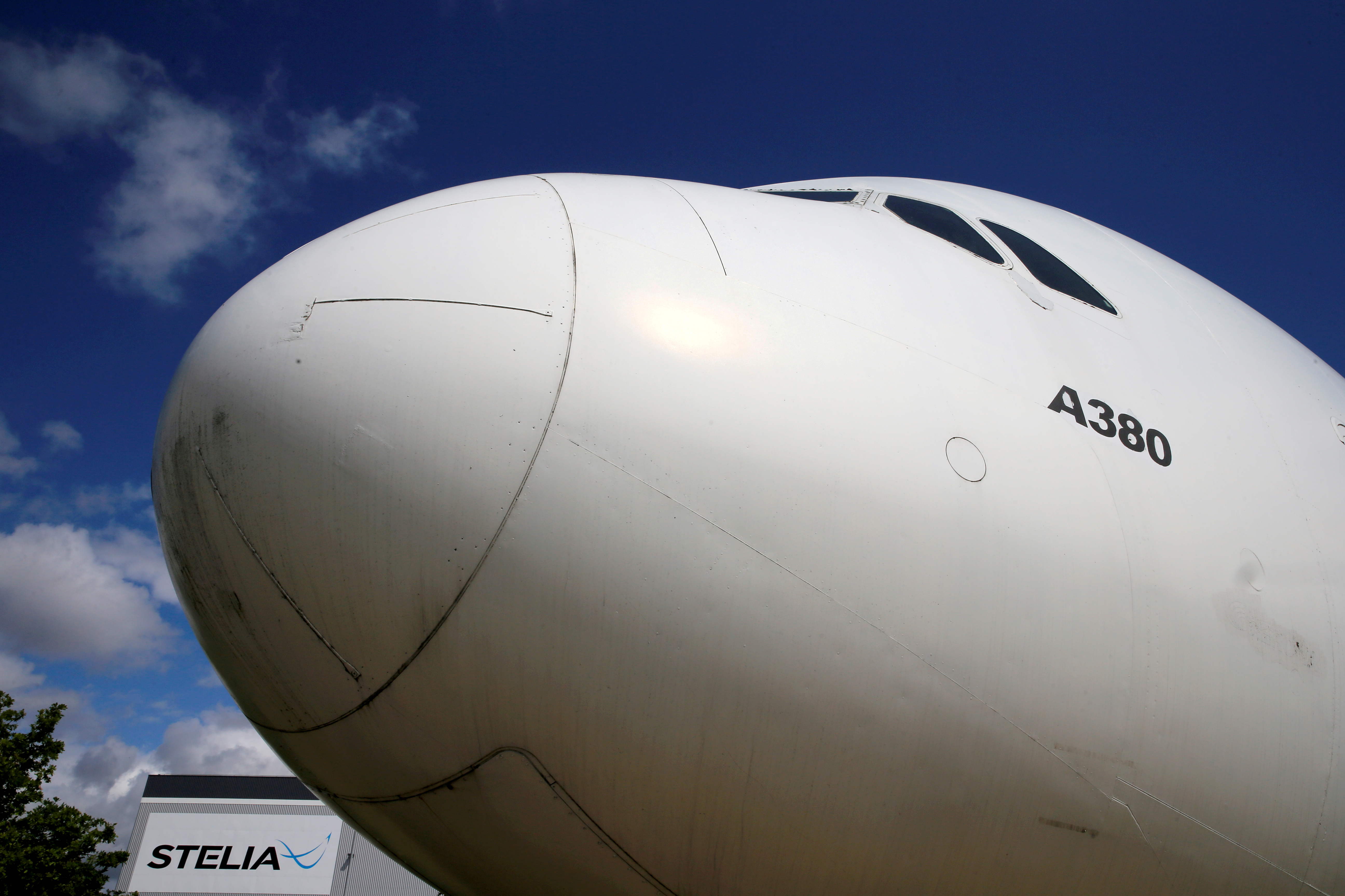 The nose of an Airbus A380 is seen outside the factory of Stelia Aerospace, a subsidiary of Airbus, in Meaulte, France, July 2, 2020. REUTERS/Pascal Rossignol/File Photo