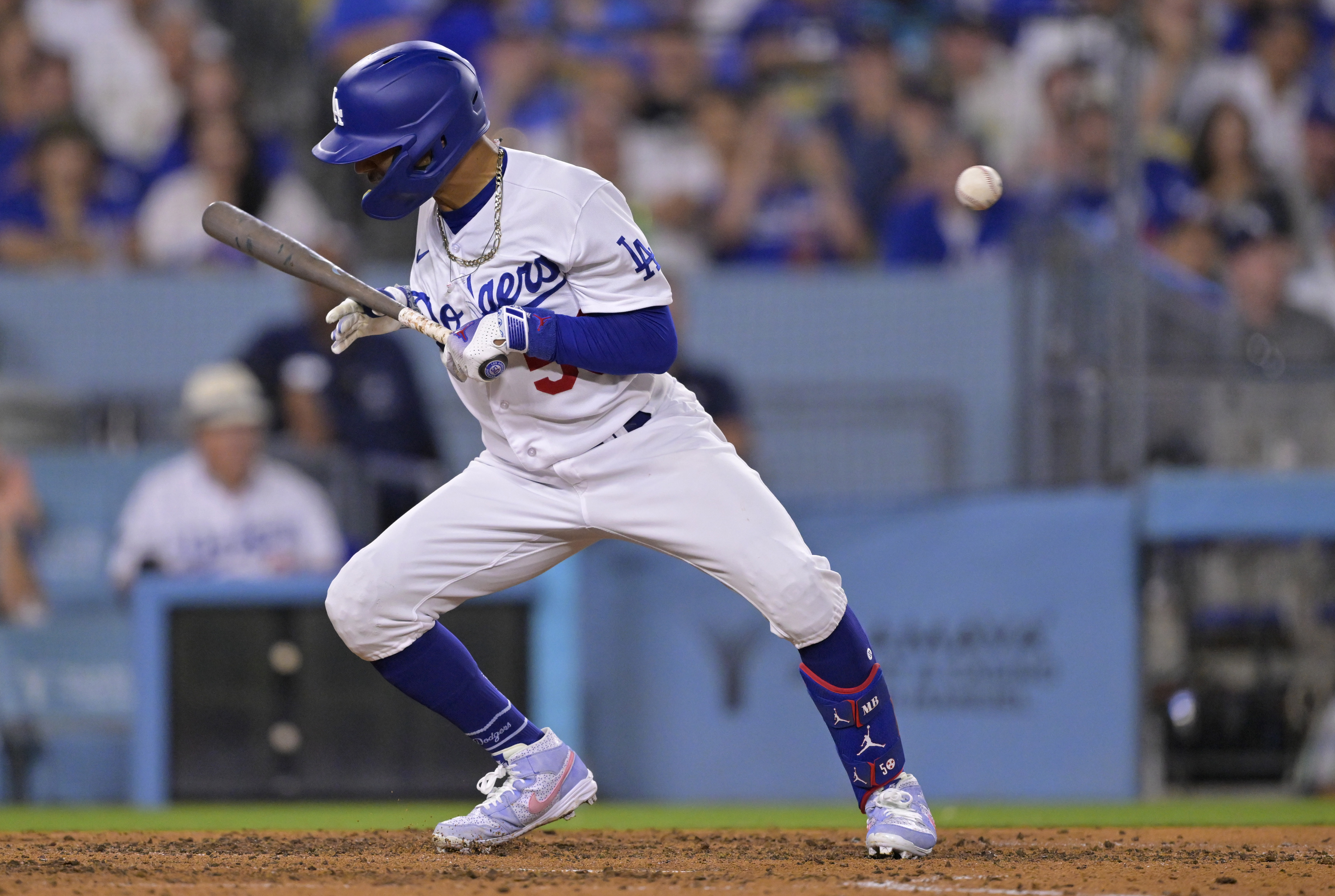 Dodgers use four-run sixth to tame Rockies, 6-1