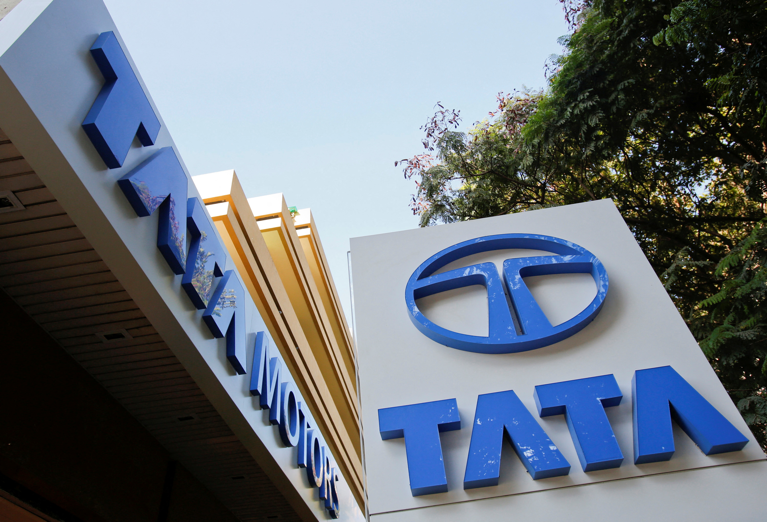 Tata Motors logos are pictured outside their flagship showroom in Mumbai