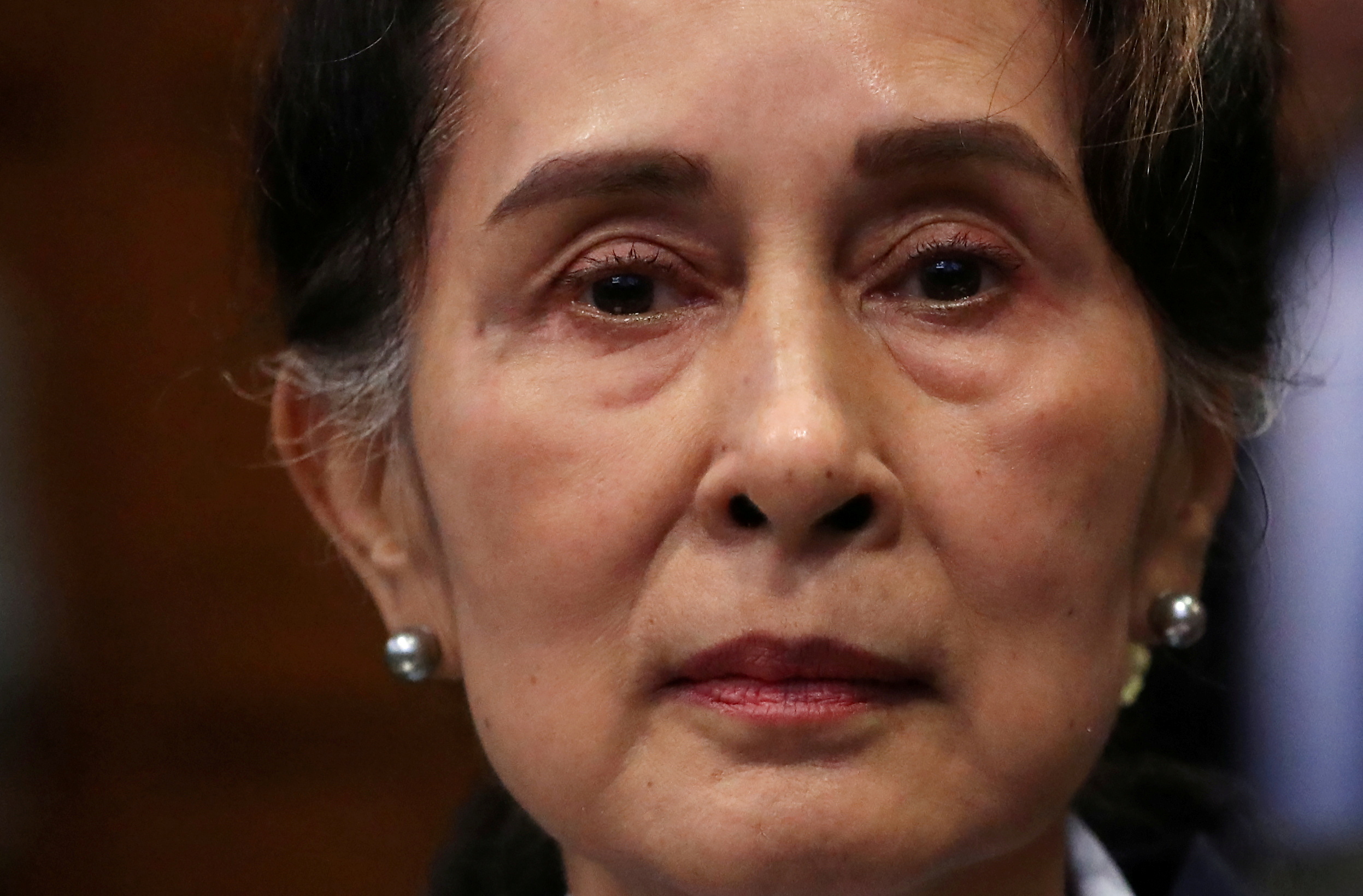 Myanmar's leader Aung San Suu Kyi attends a hearing on the second day of hearings in a case filed by Gambia against Myanmar alleging genocide against the minority Muslim Rohingya population, at the International Court of Justice (ICJ) in The Hague, Netherlands December 11, 2019.  REUTERS/Yves Herman
