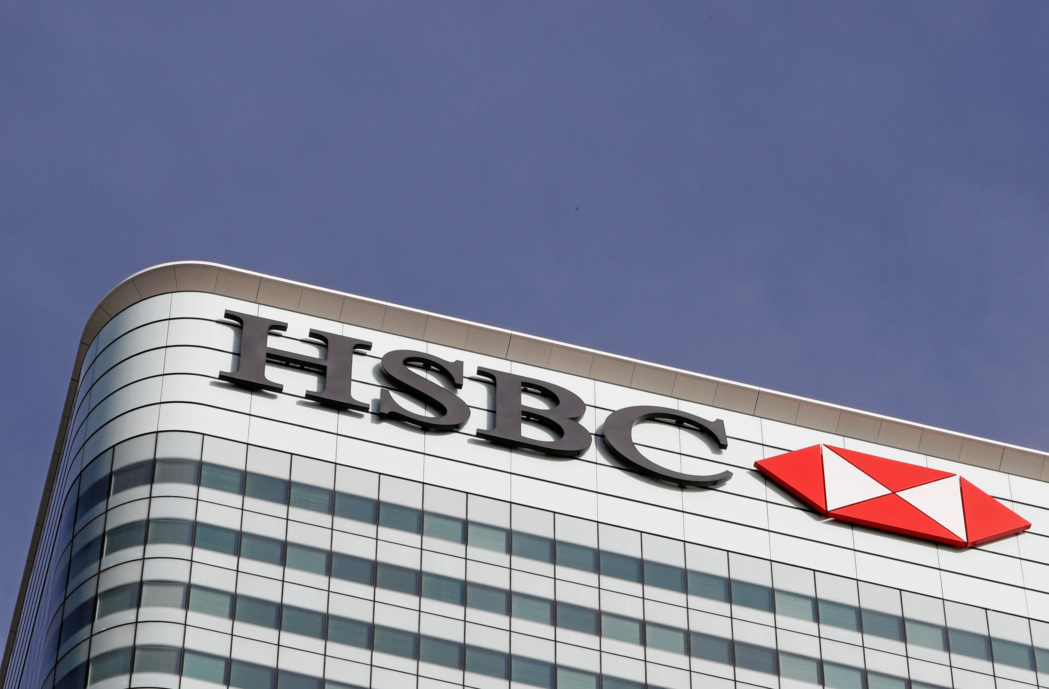 FILE PHOTO - The HSBC bank logo is seen at their offices in the Canary Wharf financial district in London