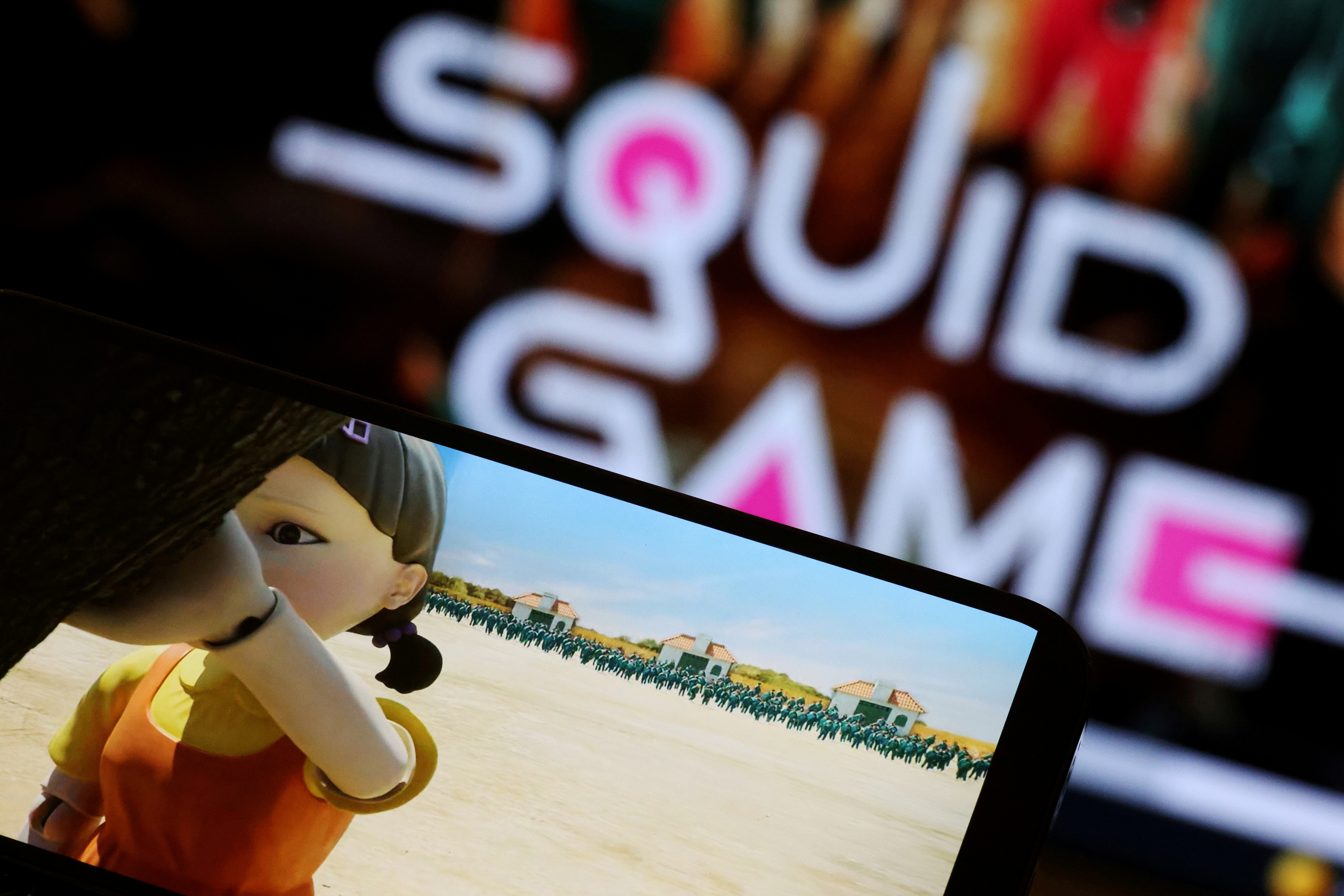 The Netflix series "Squid Game" is played on a mobile phone in this picture illustration