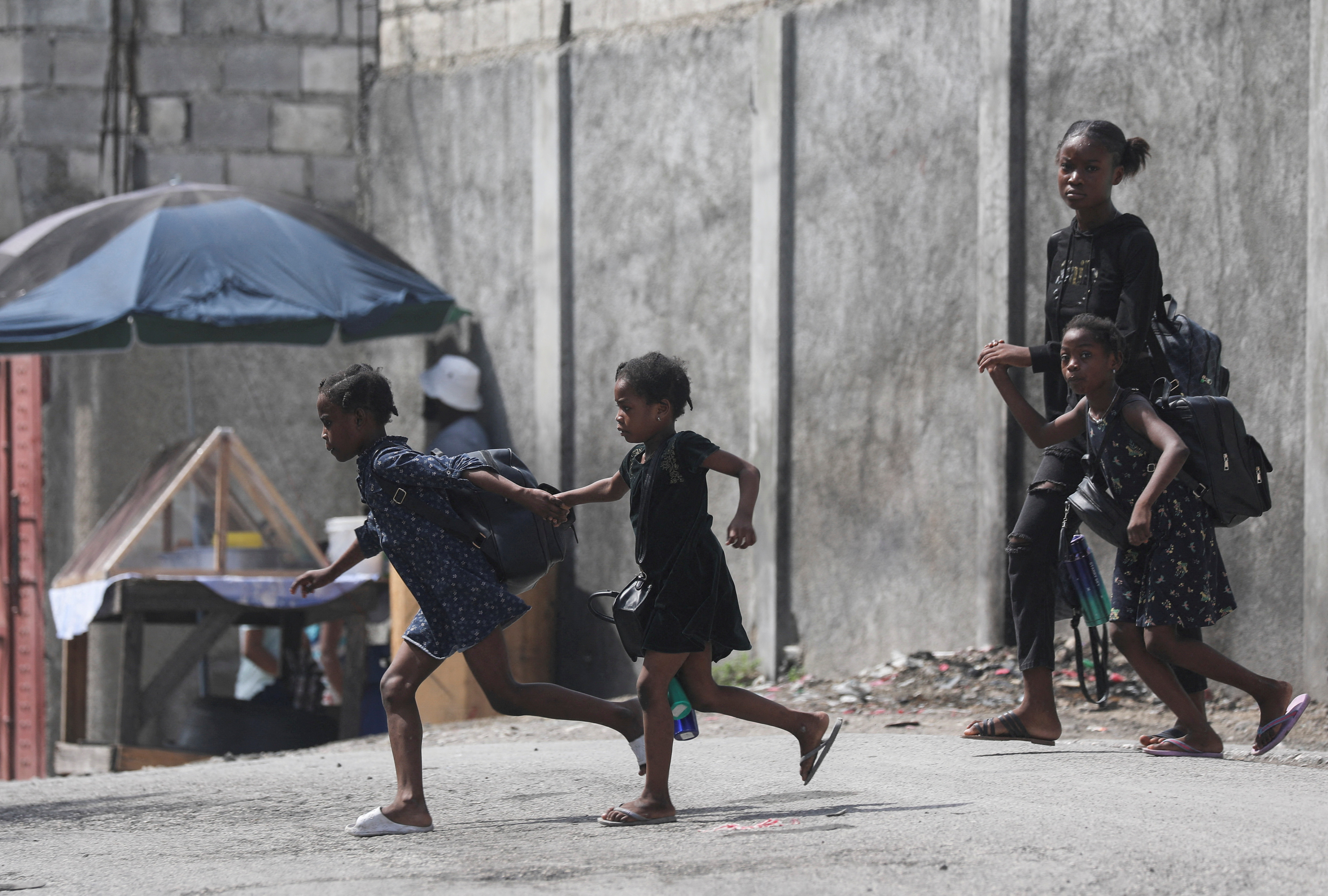 Haitians flee homes from gang violence, in Port-au-Prince