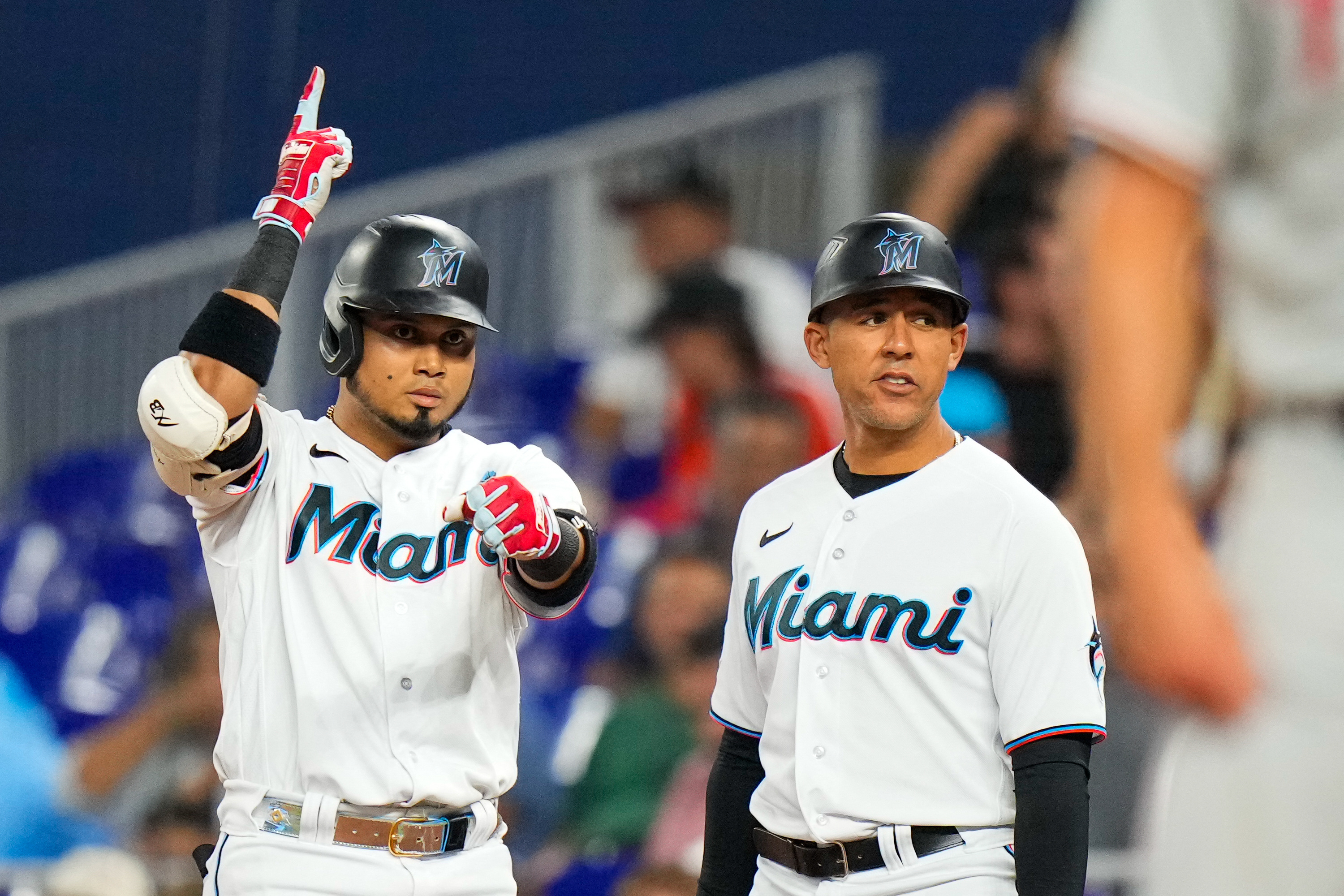 Marlins overcome three deficits, beat Phillies in 12