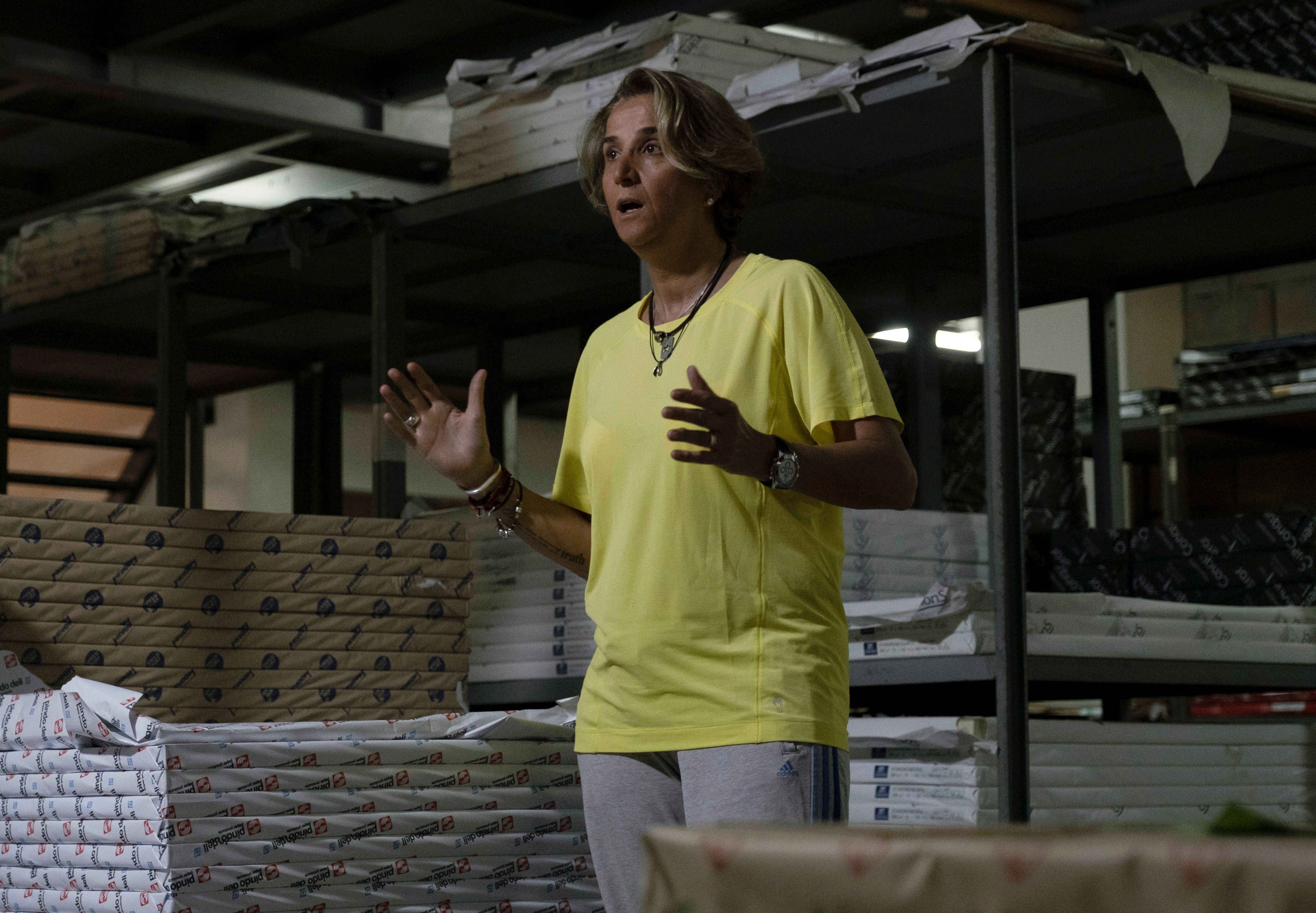 Suzanne Mouawad, a Lebanese entrepreneur, gestures as she speaks at a warehouse in Sin-el-fil