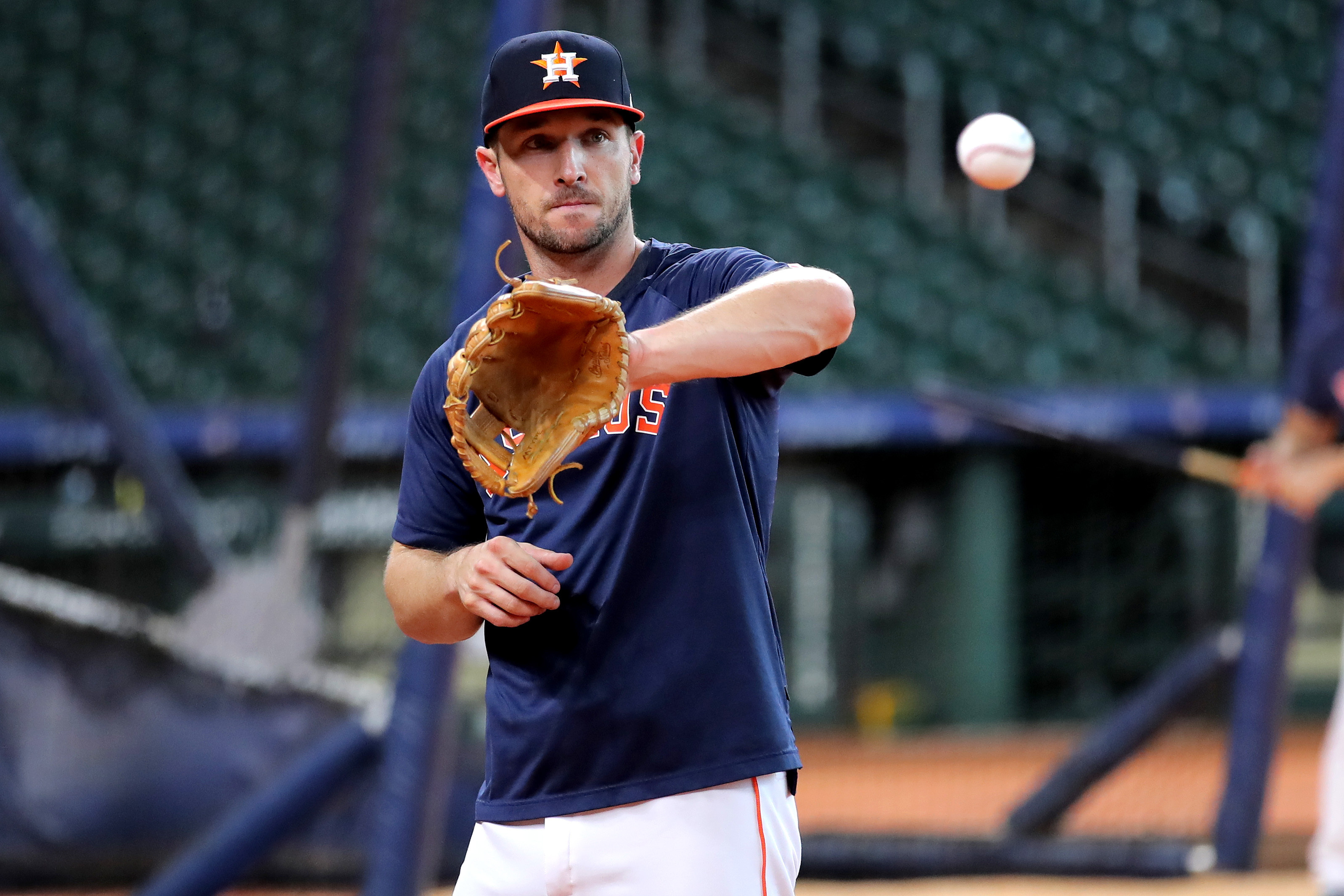 Astros flirt with no-hitter, beat A's to avoid sweep