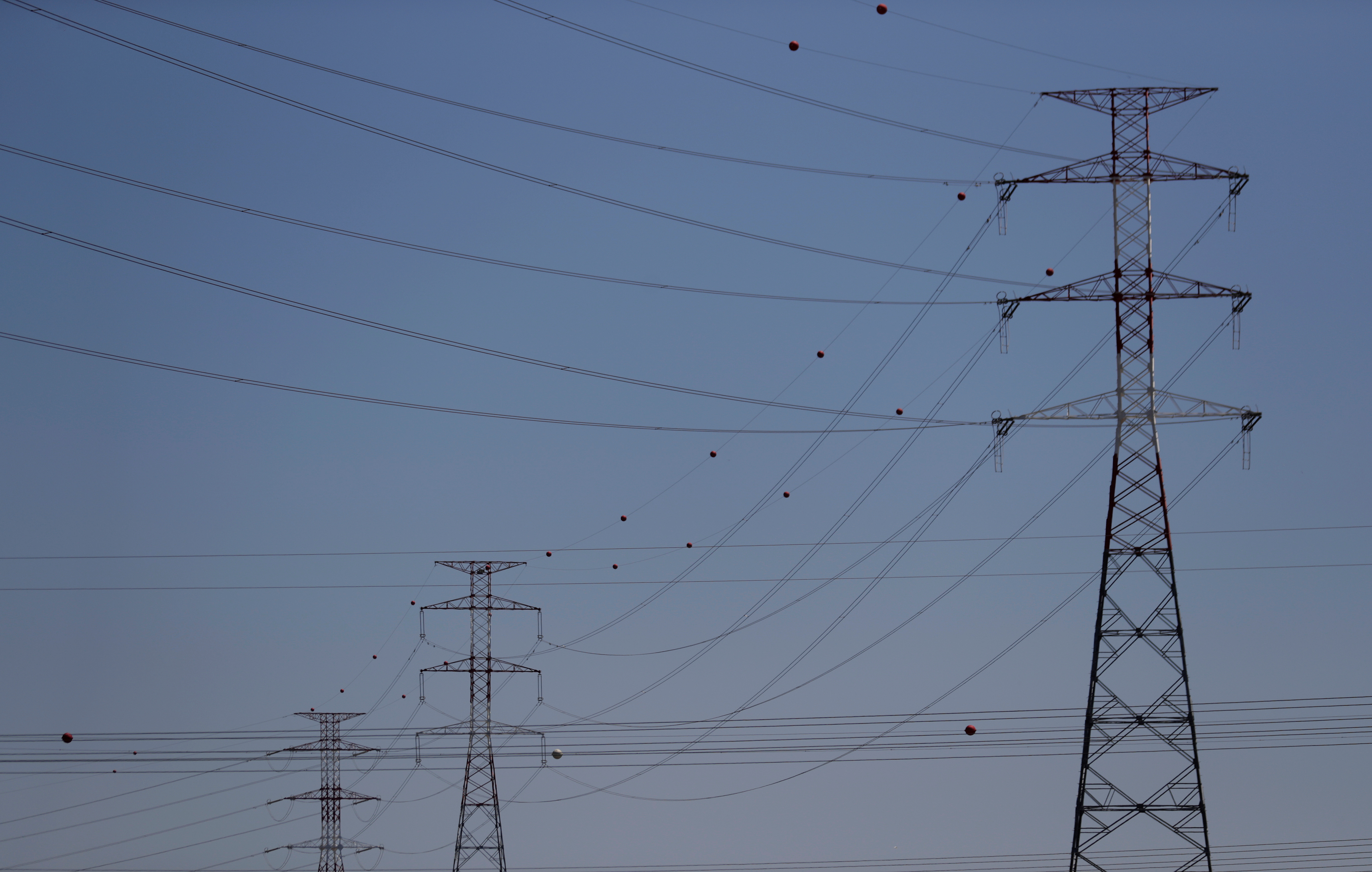 Electric power cables are seen near an Energias de Portugal (EDP) power plant on the outskirts of Carregado