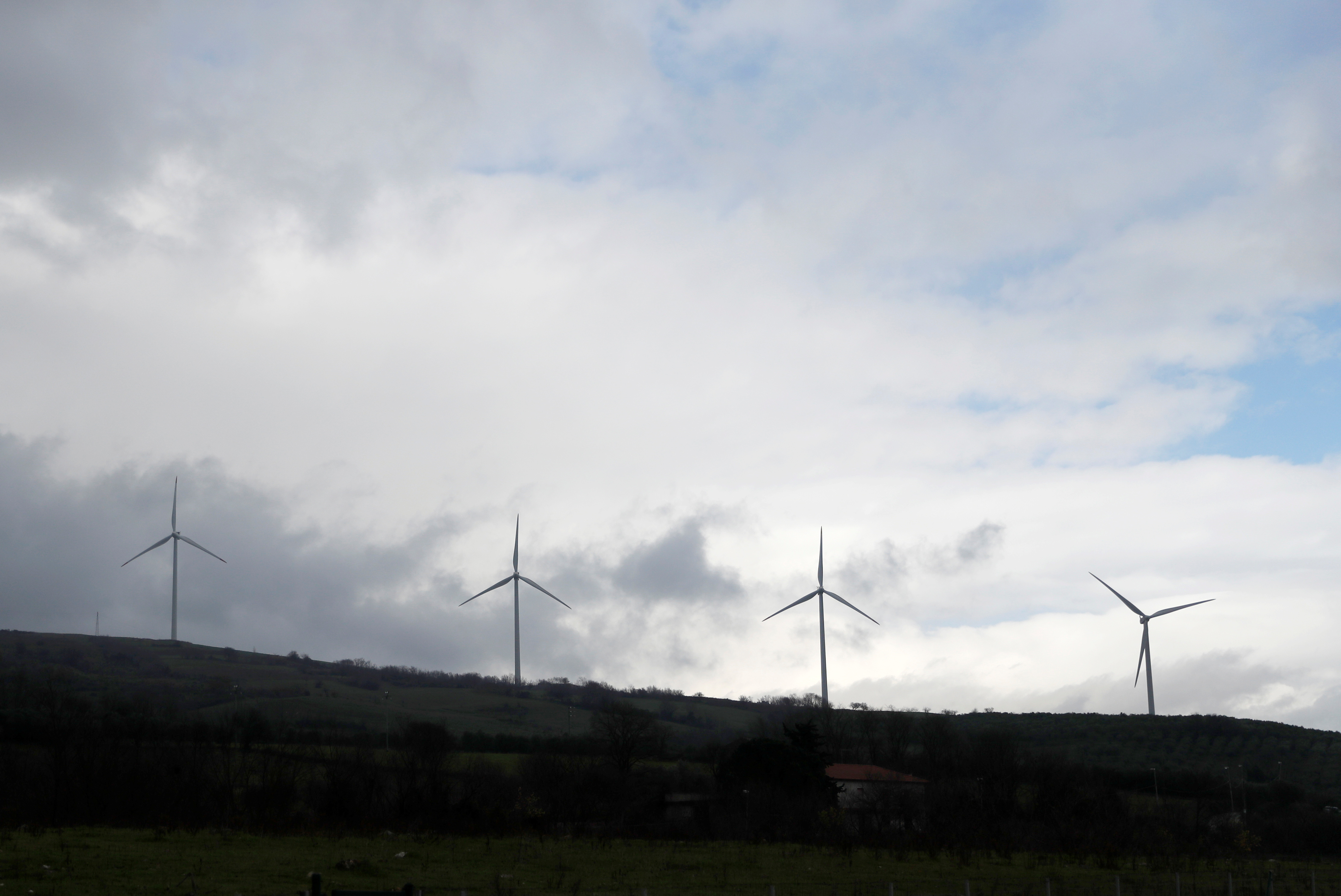 Wind turbines are seen along the A2 motorway