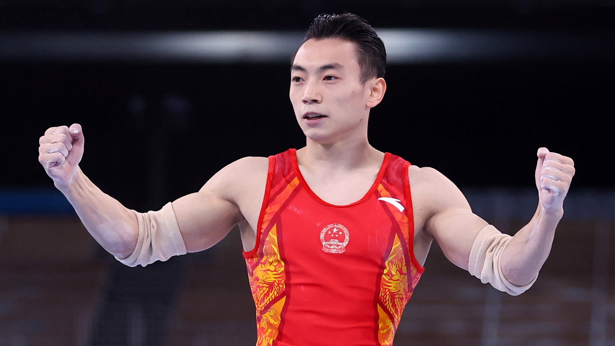 Gymnastics-China's Zou wins parallel bars gold | Reuters