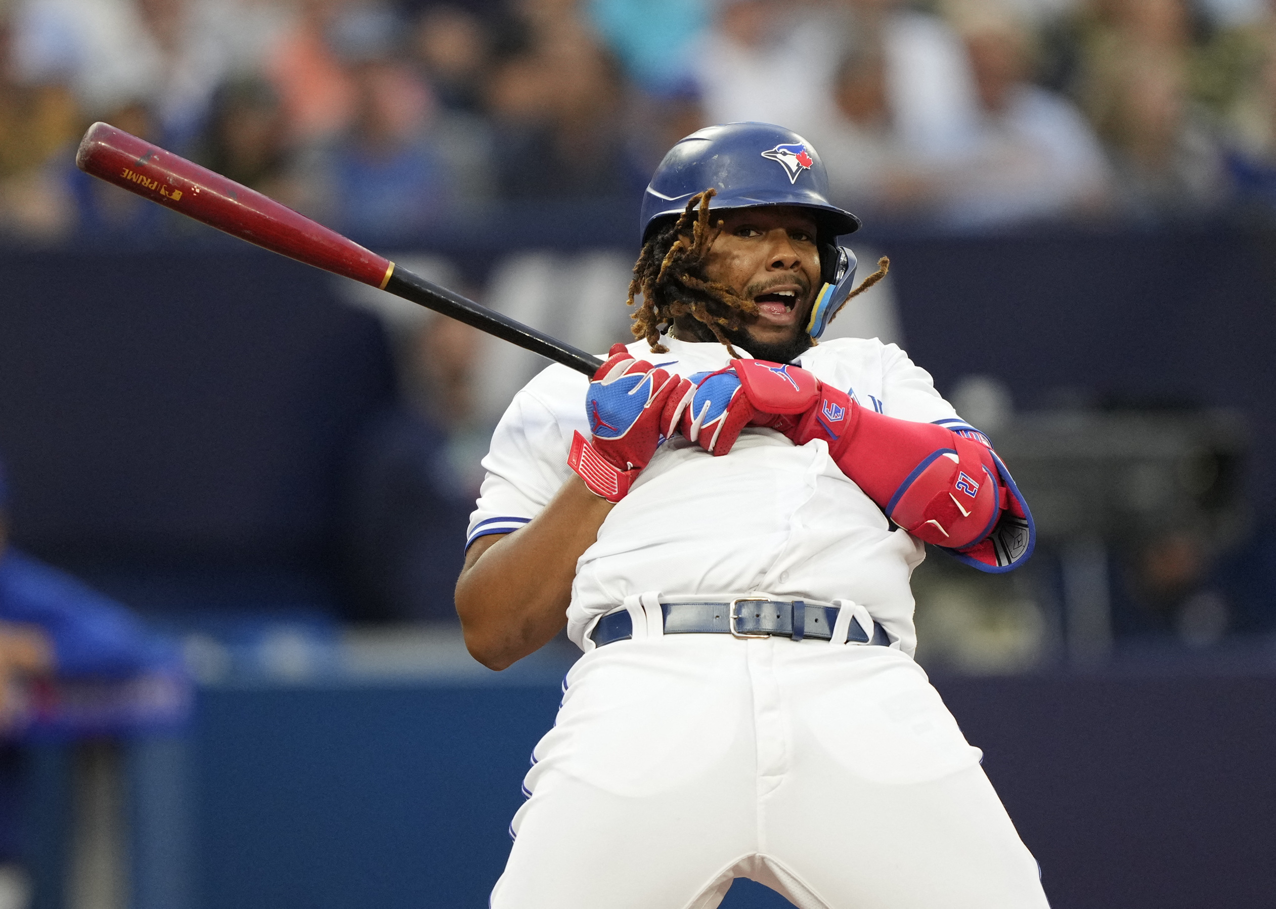 Download Vladimir Guerrero Jr Swinging Baseball Bat Wallpaper