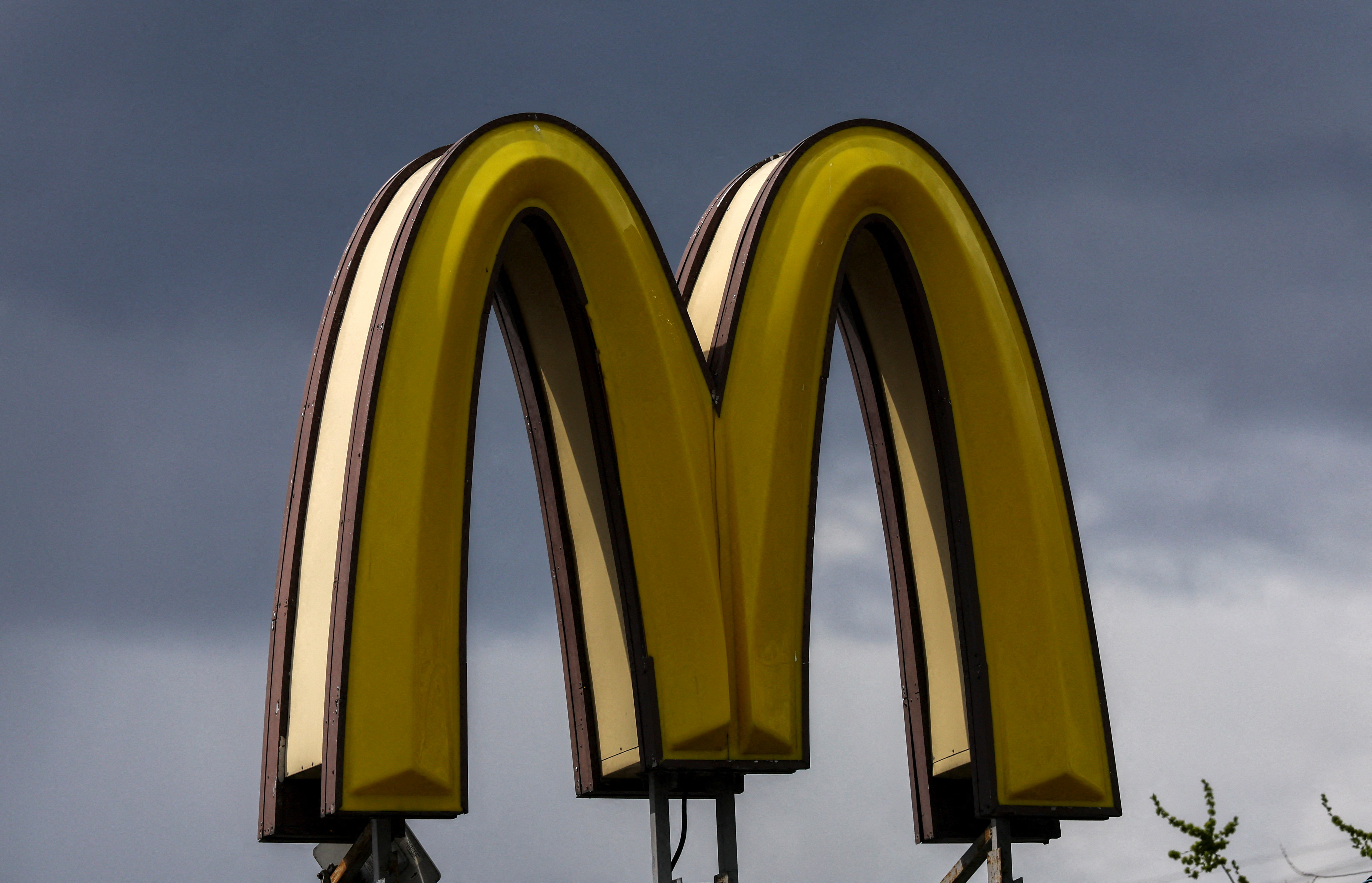 A sign with the logo is on display outside a McDonald's restaurant in Moscow