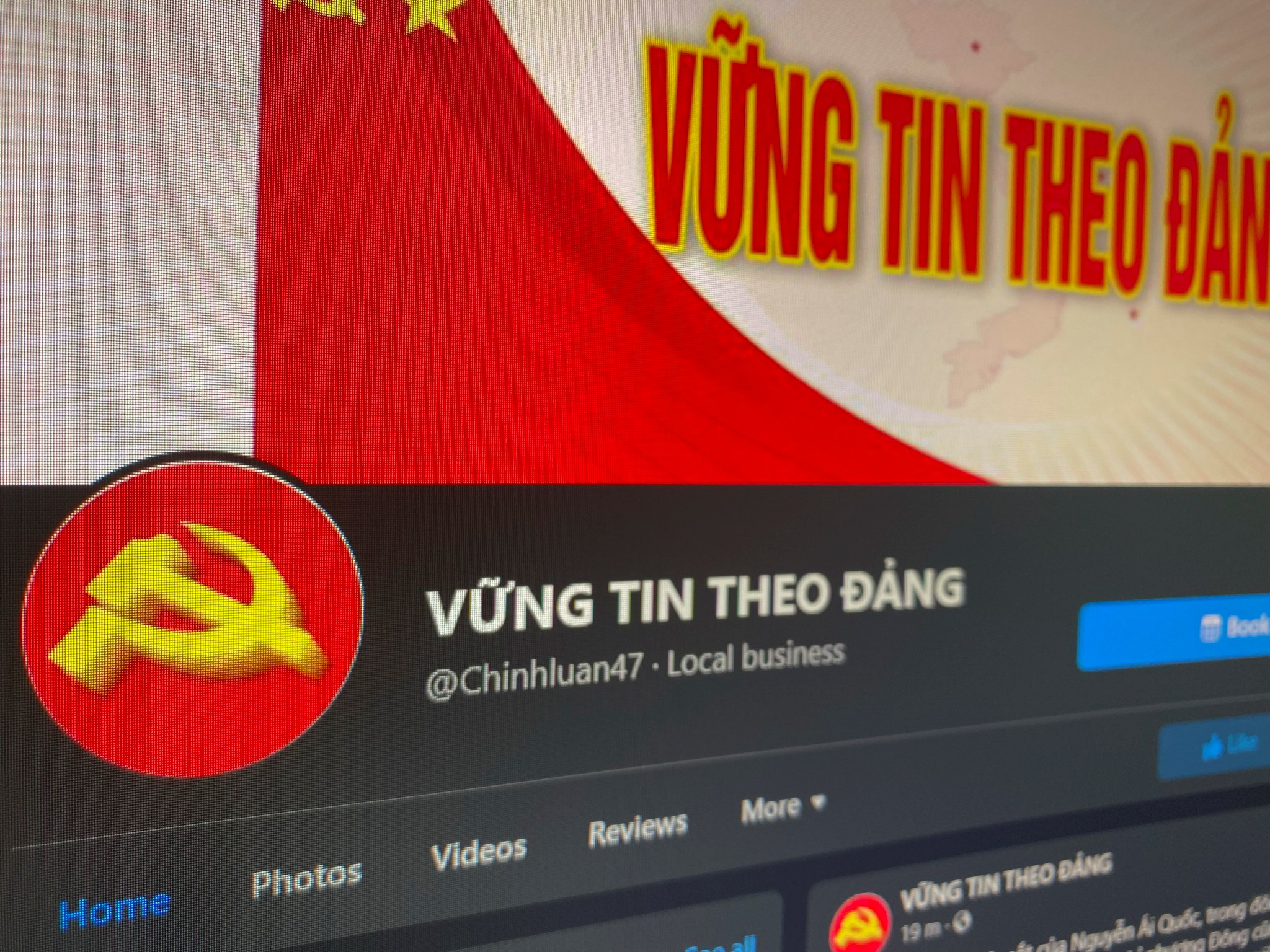 A Facebook page of a group called 'Believe in the Party' which was identified by Vietnamese state media as being controlled by 'Force 47' cyber troops, is displayed on screen in this photo taken July 6, 2021 by REUTERS
