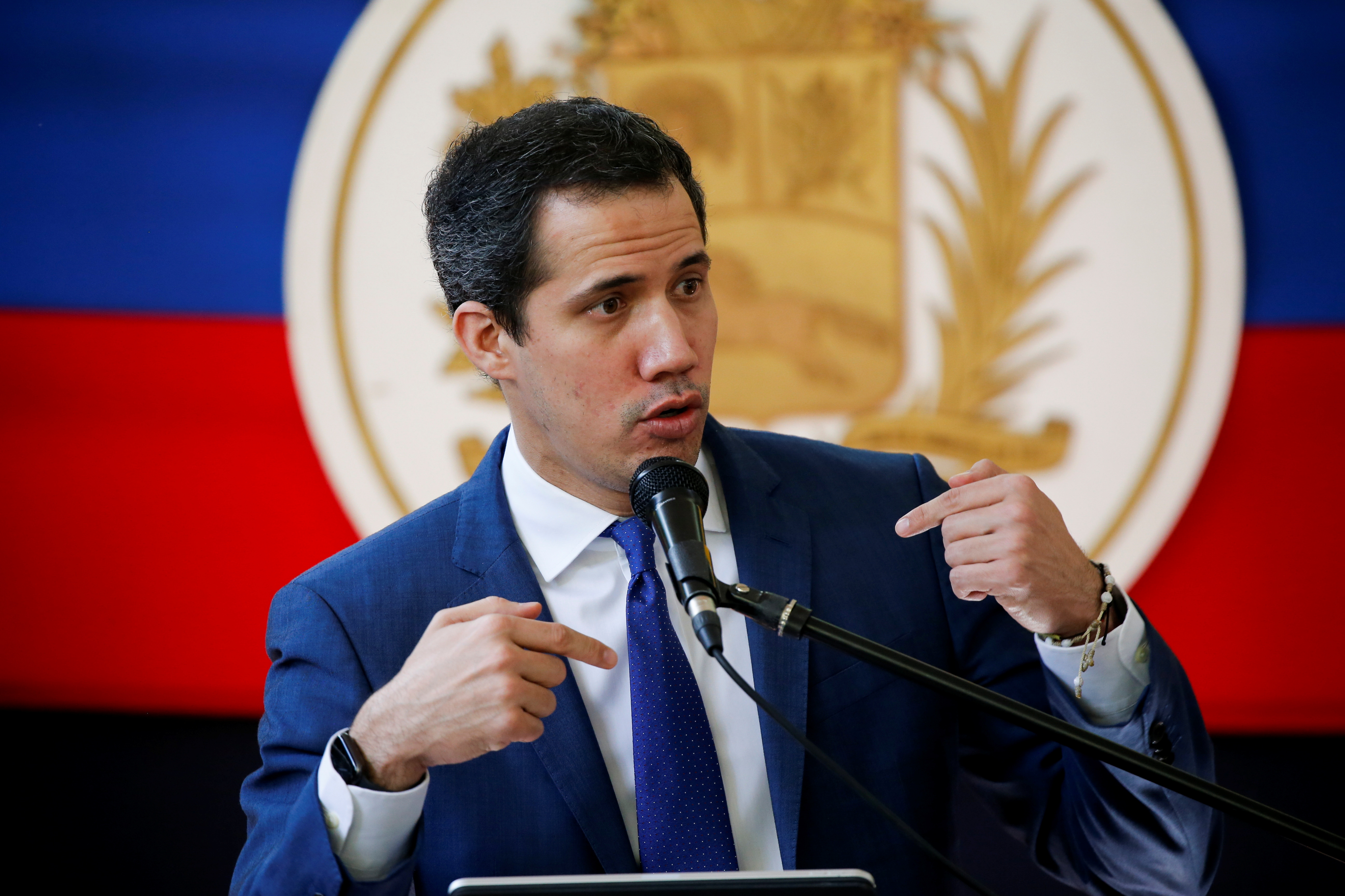 Venezuela's opposition leader Juan Guaido addresses the media the day after regional and local elections, in Caracas