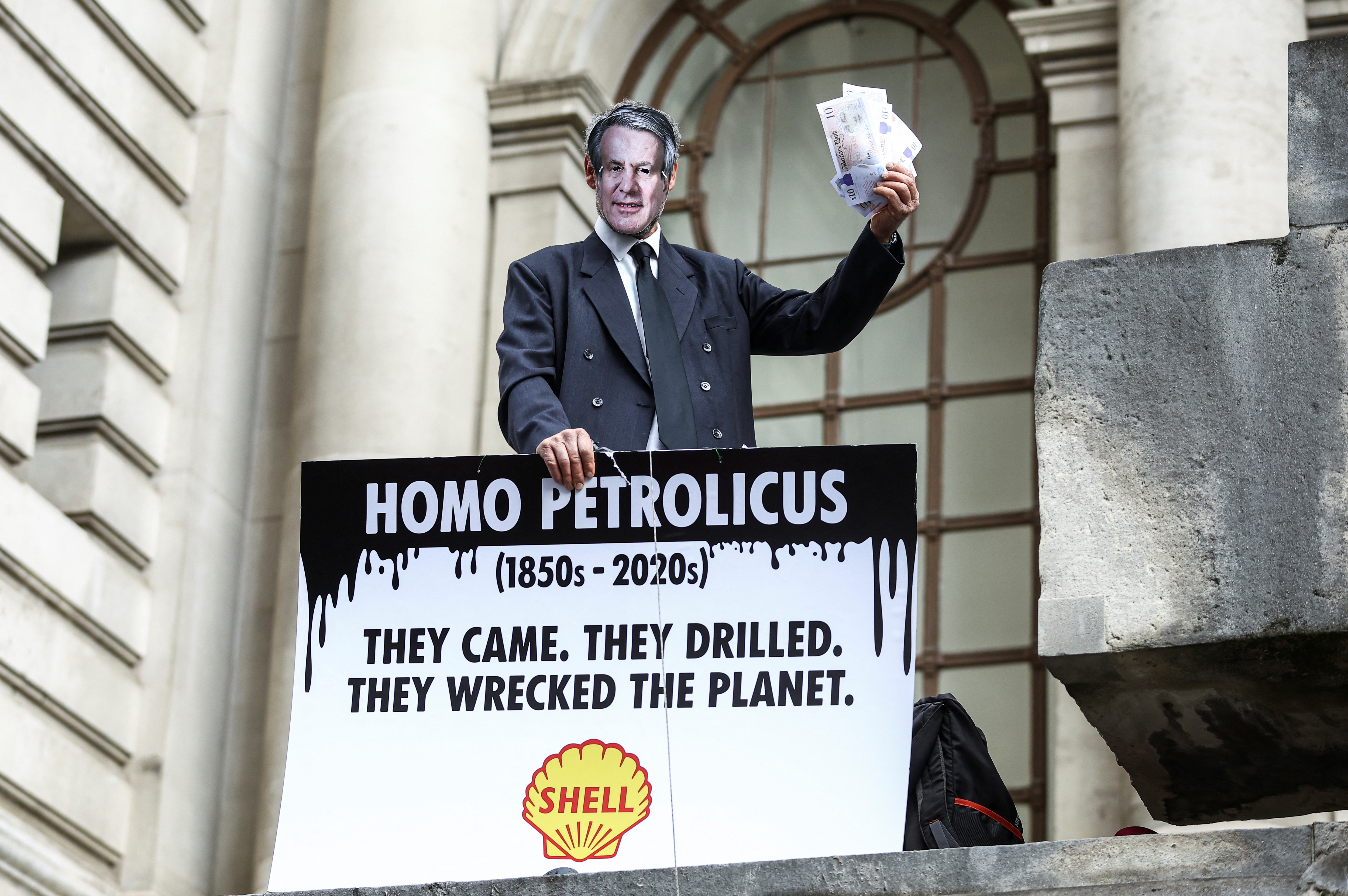 Climate activists stage a protest as Shell holds annual shareholder meeting