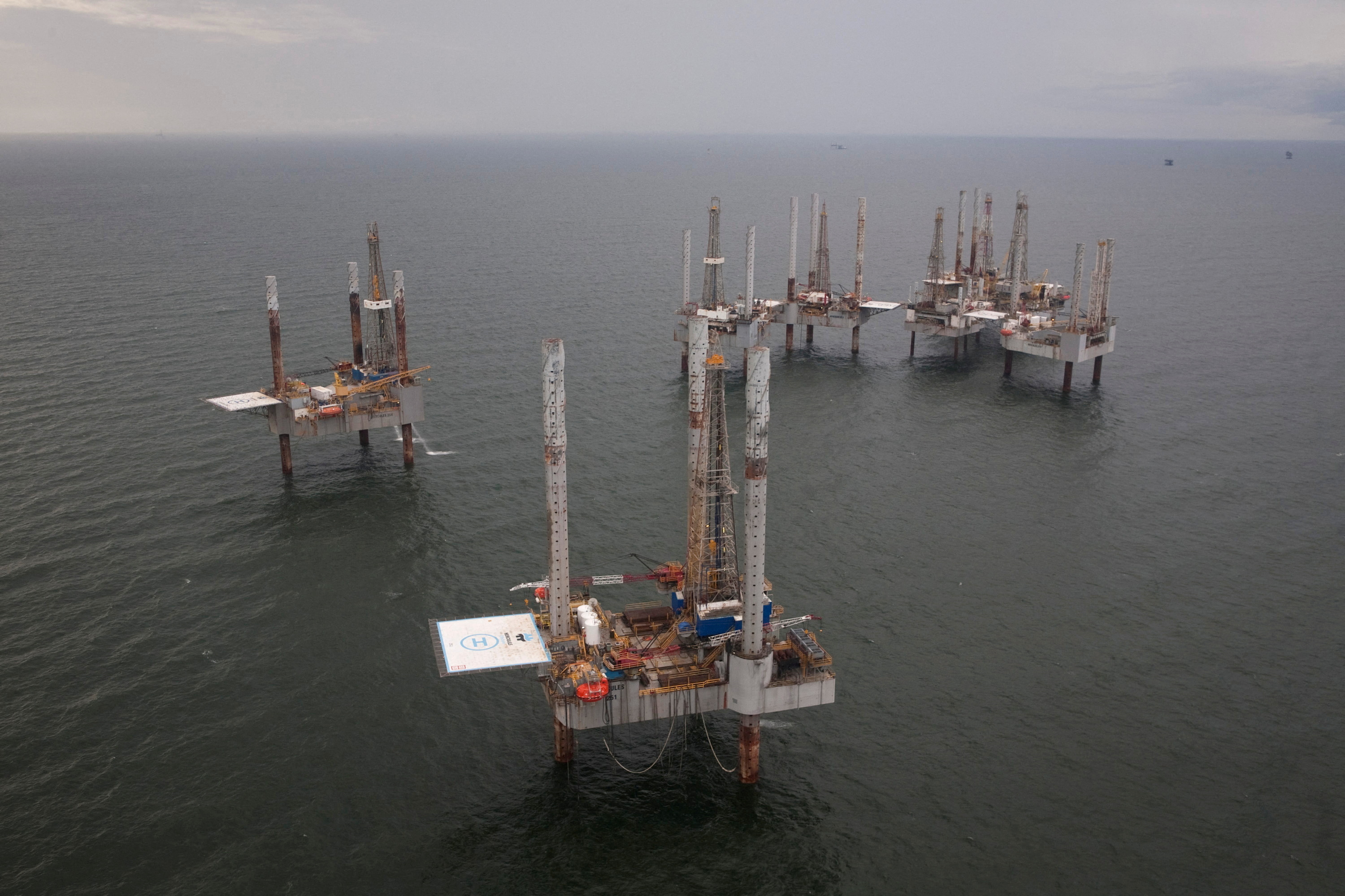Unused oil rigs sit in the Gulf of Mexico near Port Fourchon, Louisiana
