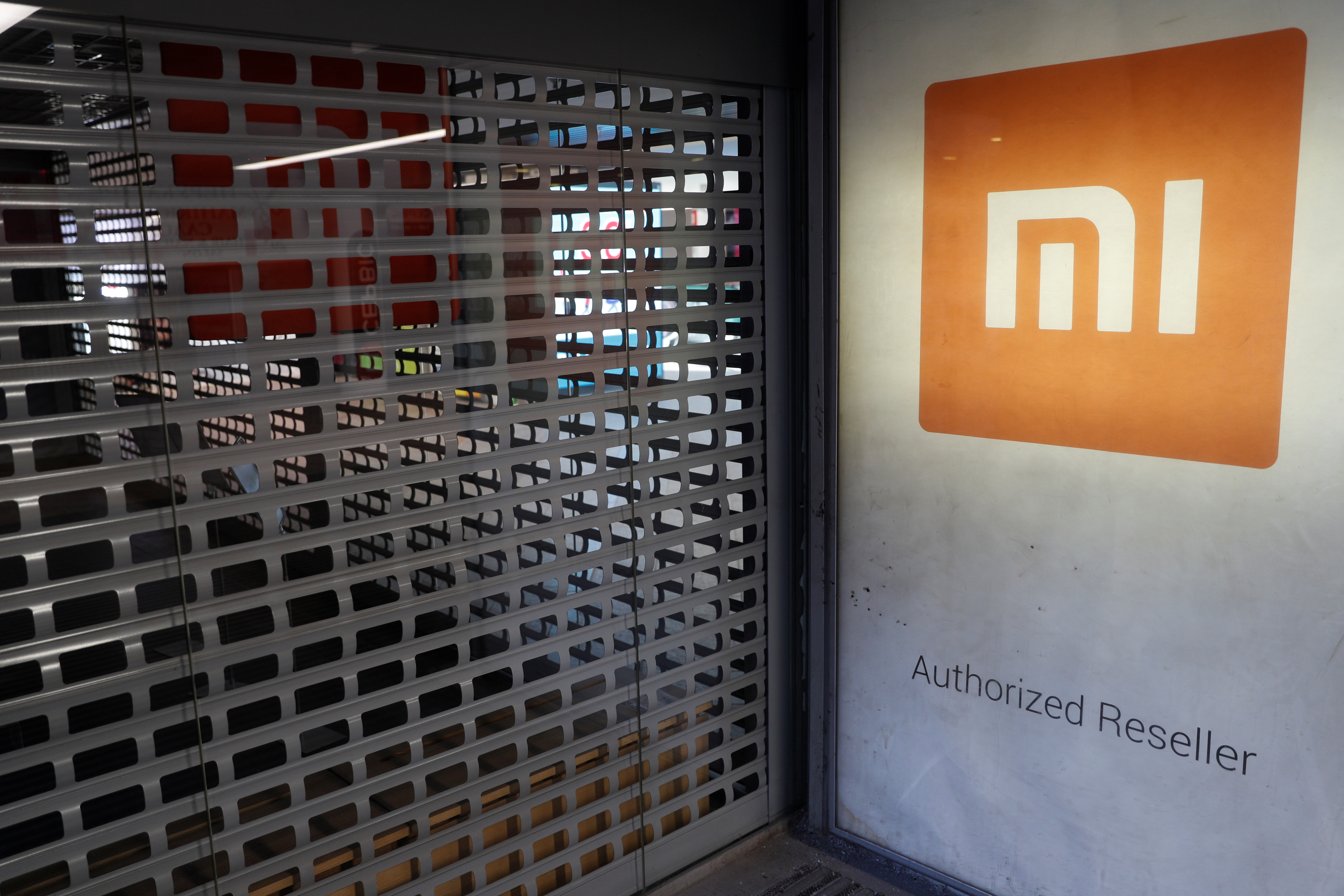 Xiaomi logo is seen on a closed brand's store in central Kiev