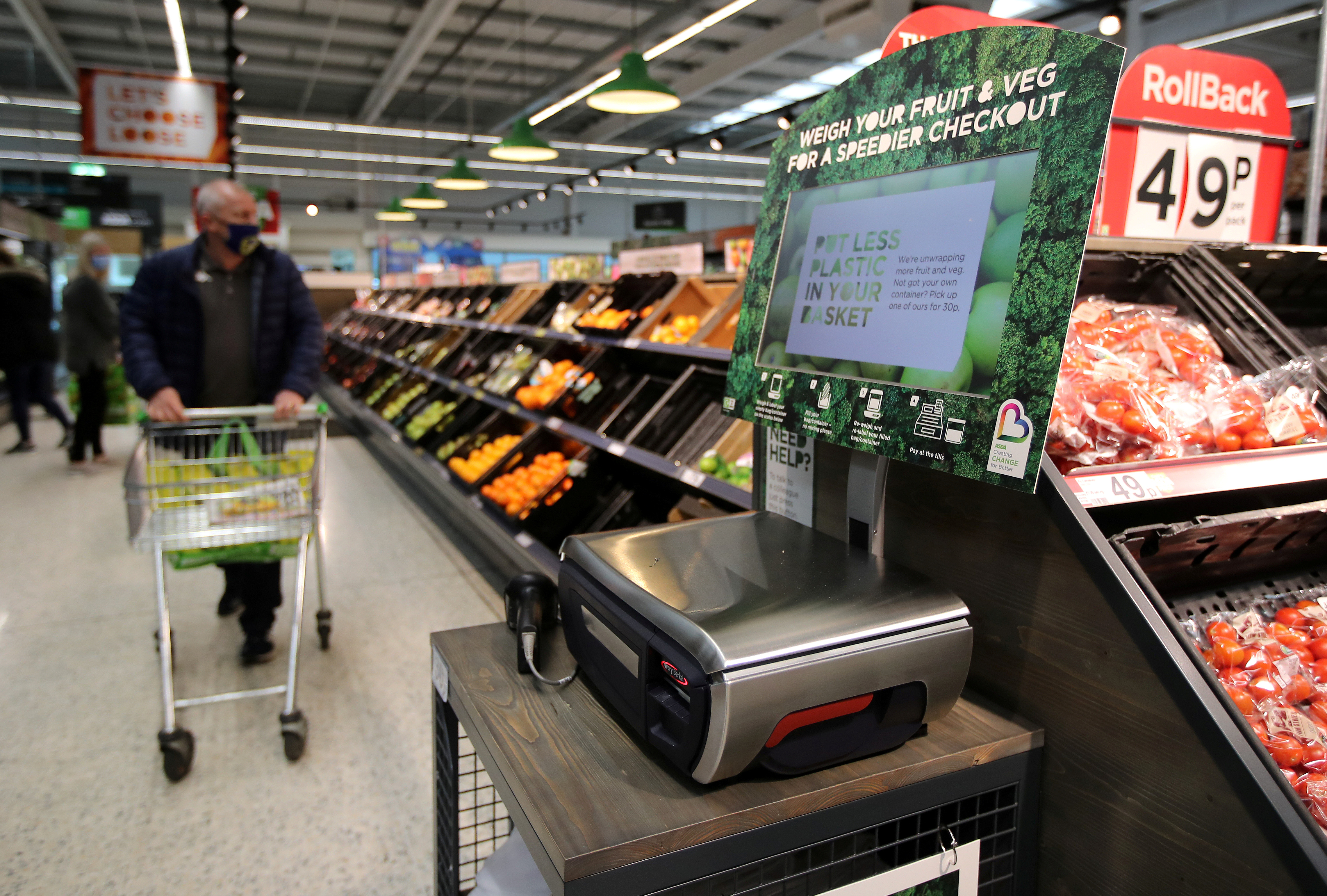 Scales to weigh loose fresh produce are seen in the UK supermarket Asda in Leeds