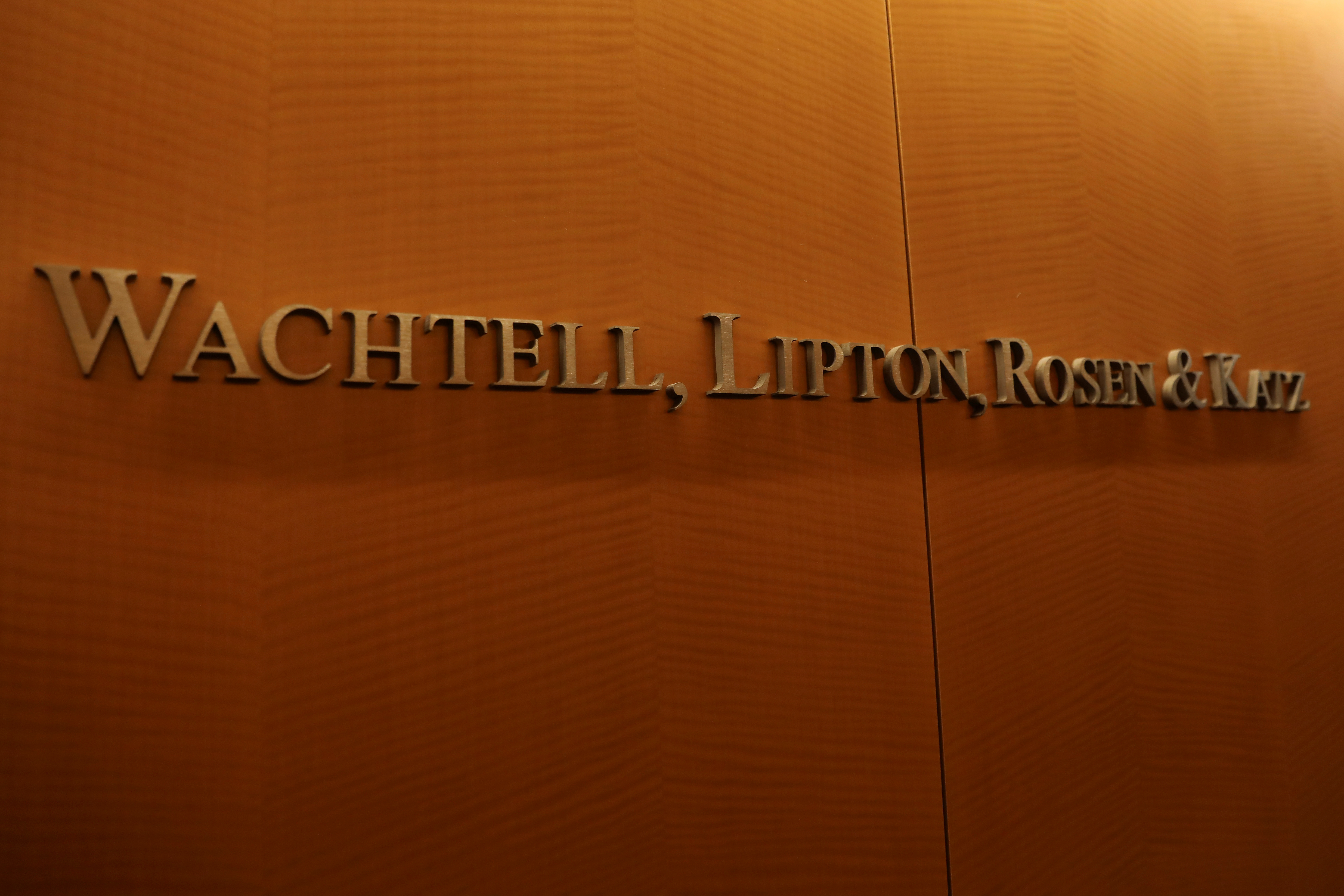 The logo for the Wachtell, Lipton, Rosen & Katz law firm is seen at their office in New York
