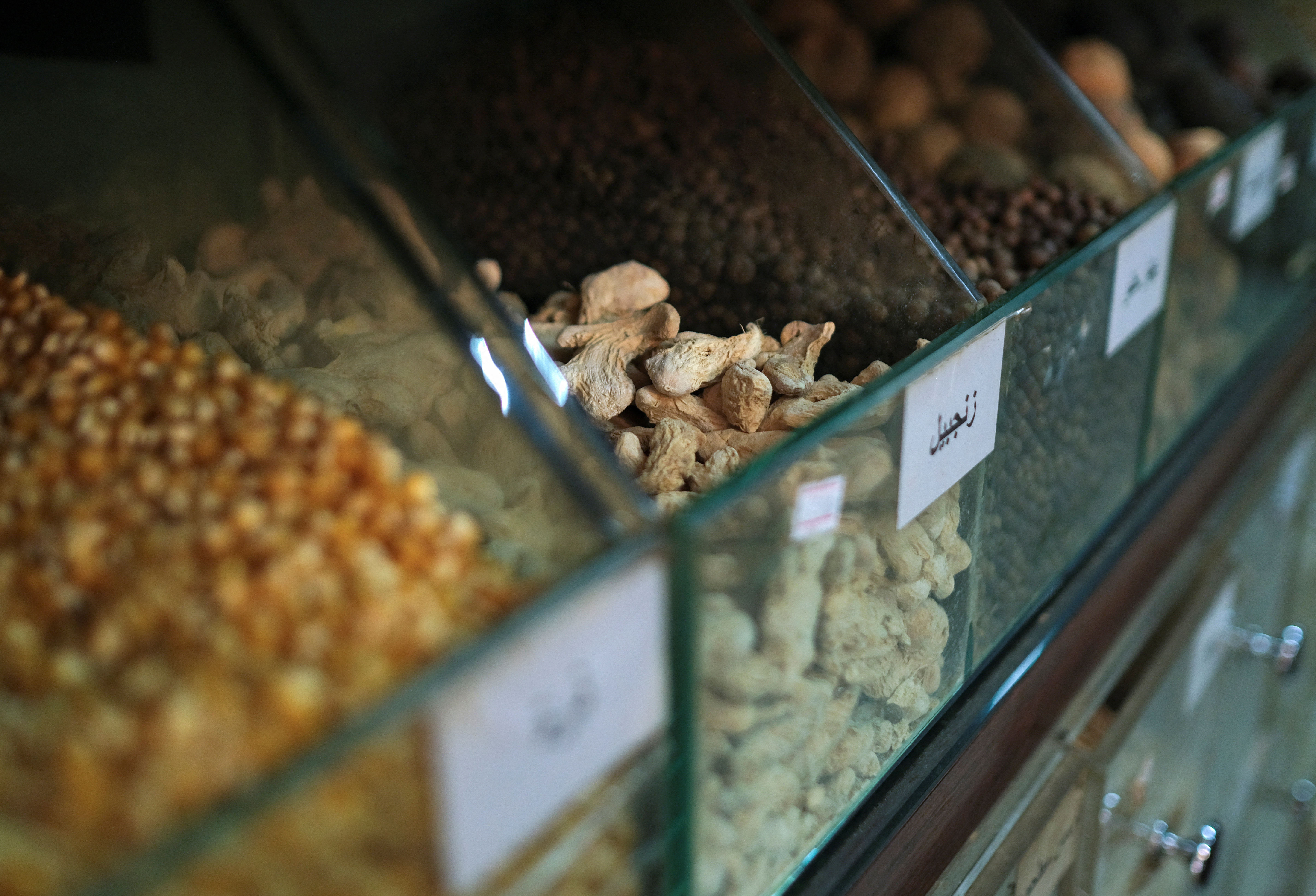 Dried ginger displayed for sale inside the shop of apothecarist Kamal Al-Shahal, in Tripoli