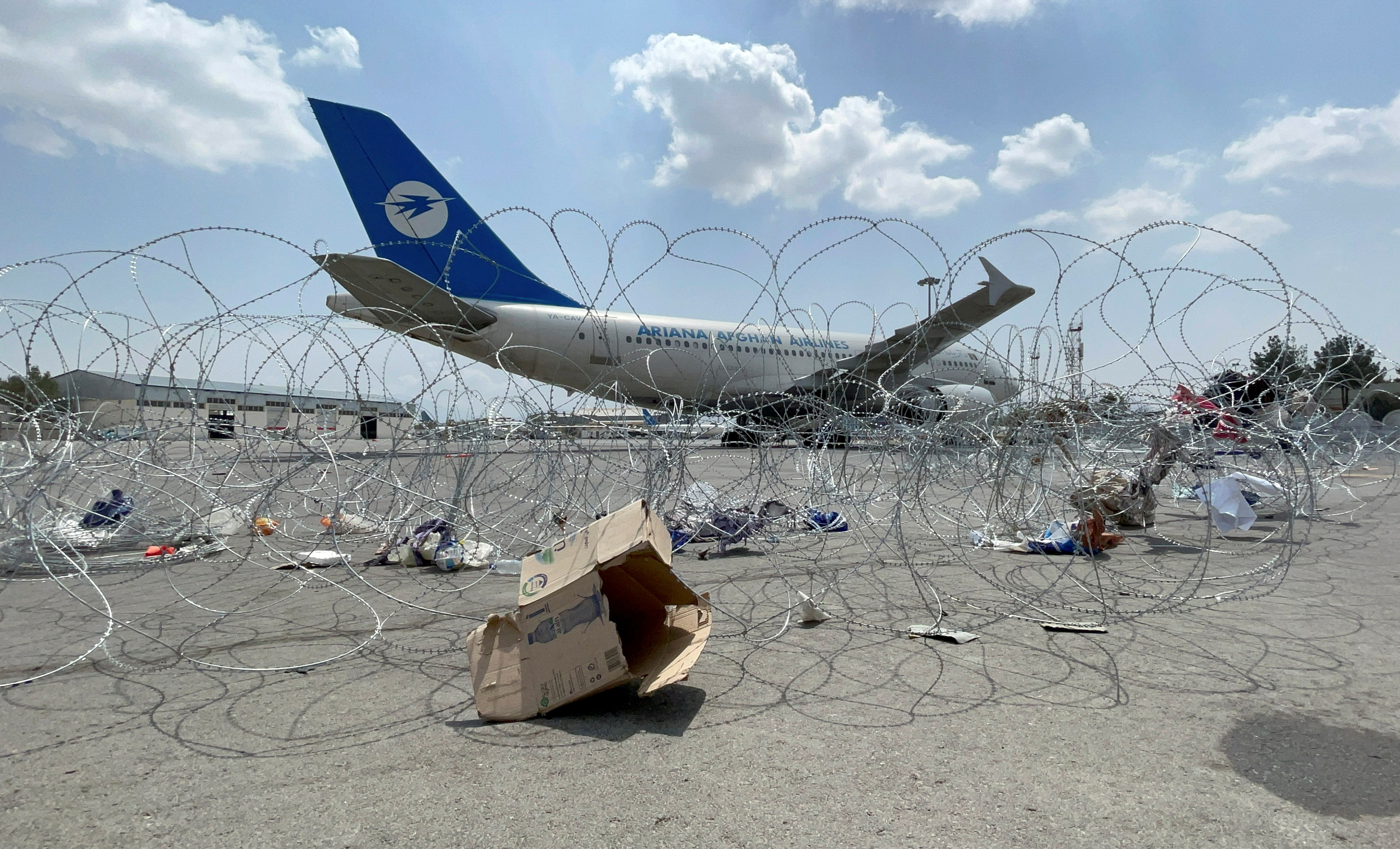 A commercial airplane is seen at the Hamid Karzai International Airport a day after U.S troops withdrawal in Kabul